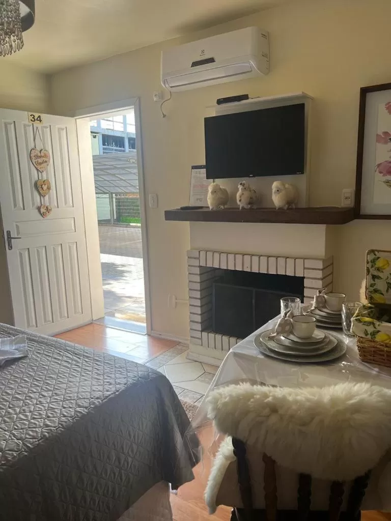 TV/Entertainment Center in Pousada Lanai Canela