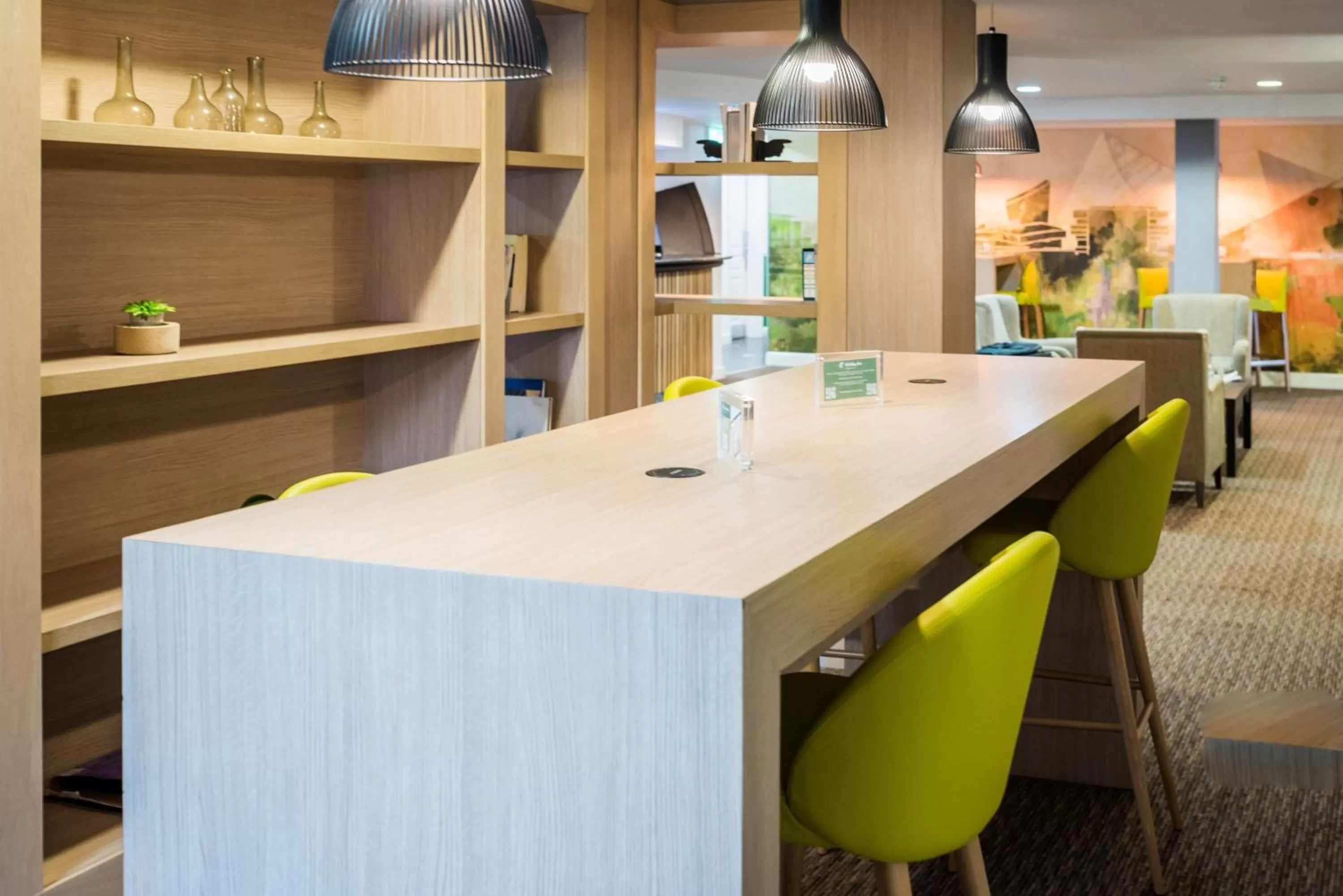 Lounge or bar in Holiday Inn Manchester West by IHG