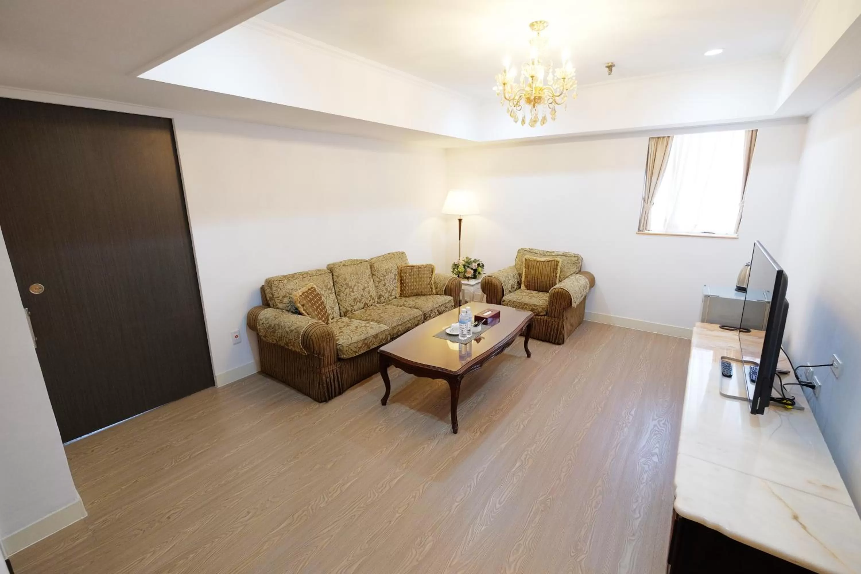 Living room in Dynasty Hotel