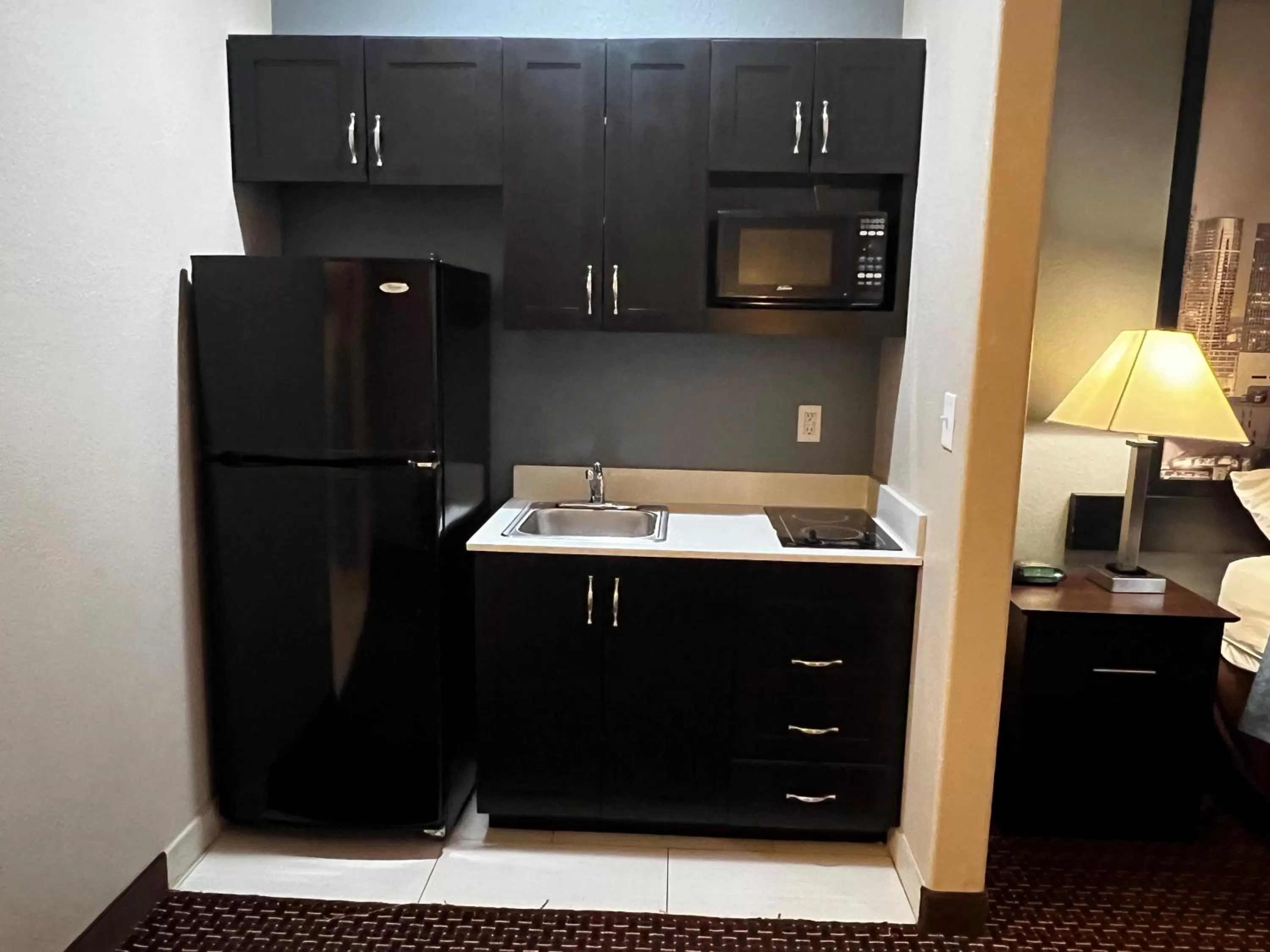 Kitchen or kitchenette in Super 8 by Wyndham Center