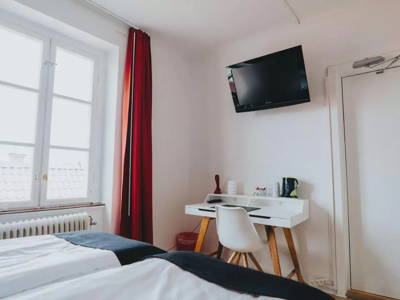 Photo of the whole room, Bed in Arboga Stadshotell Photo of the whole room, Bed in Arboga Stadshotell