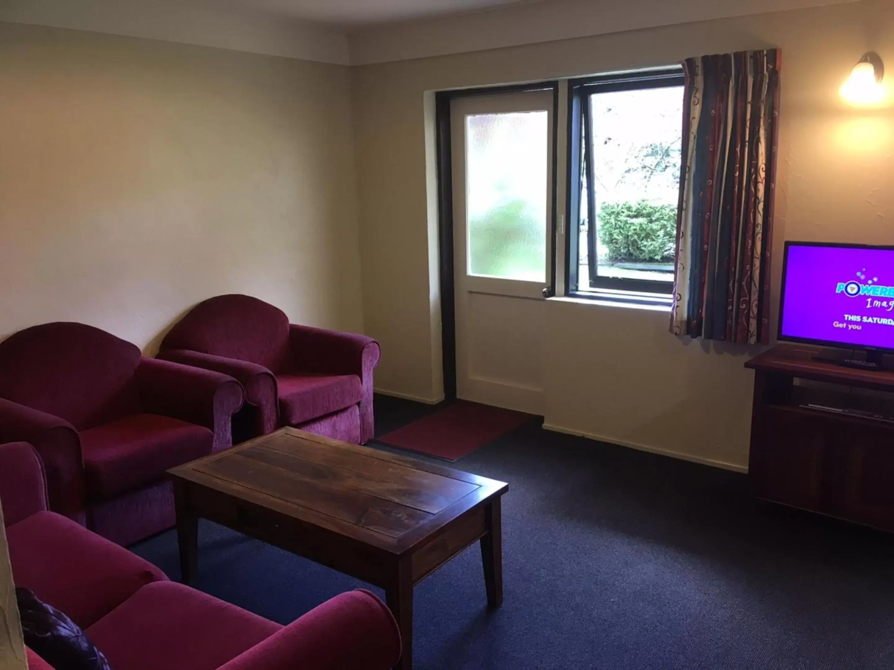 Living room, Seating Area in Woodlands Motels And Apartments