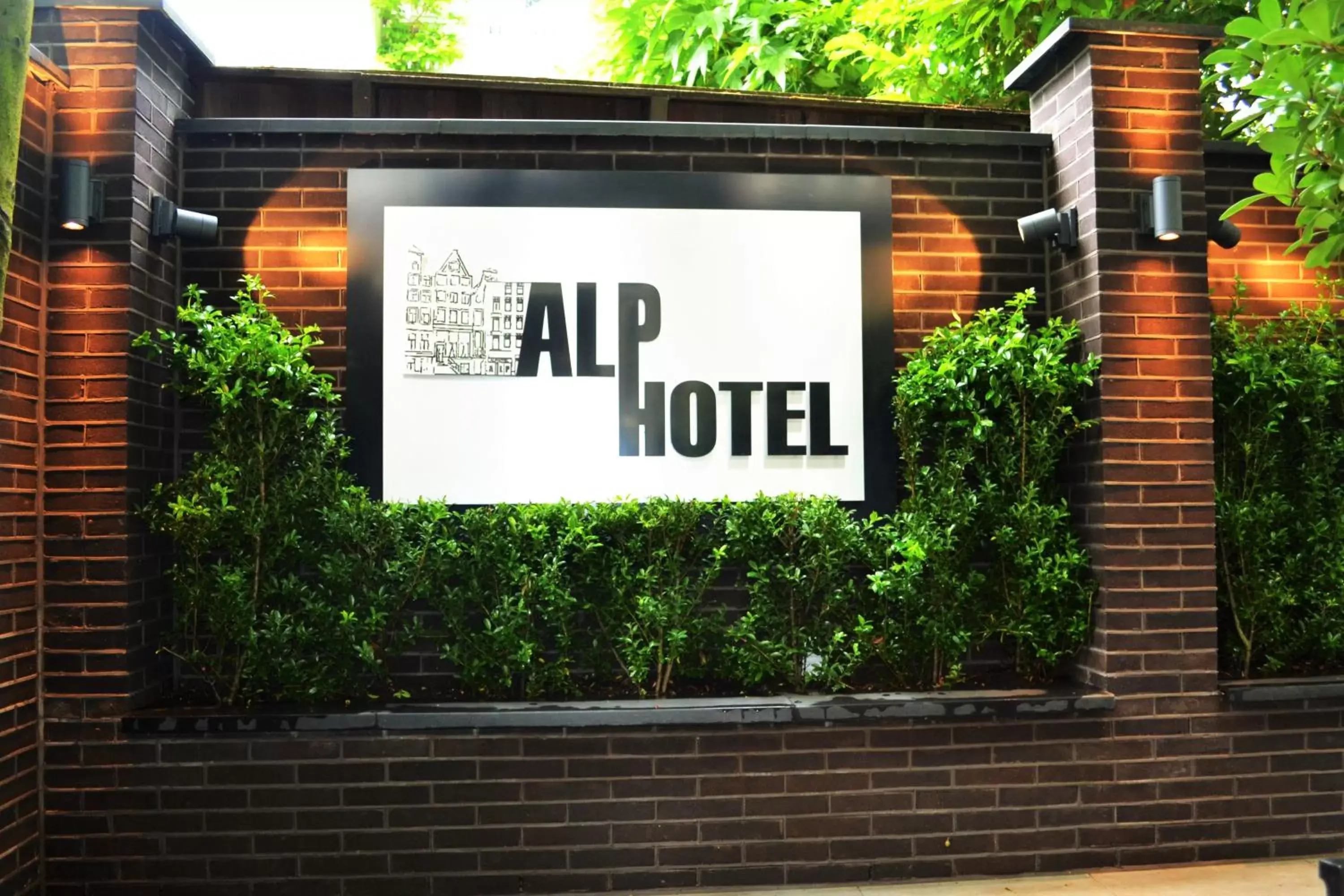 Property logo or sign in Alp Hotel