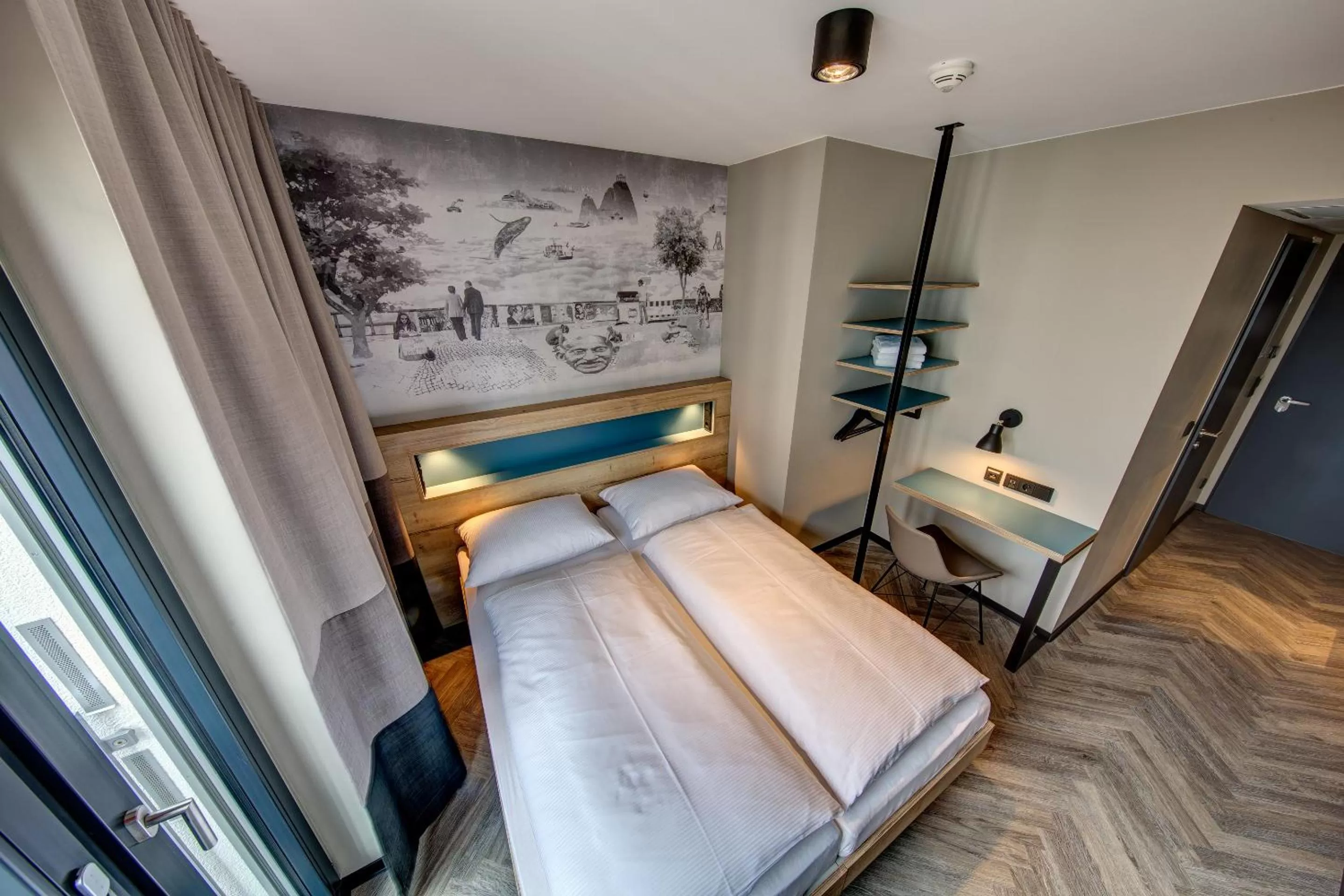 Bed in Schulz Hotel Berlin Wall at the East Side Gallery