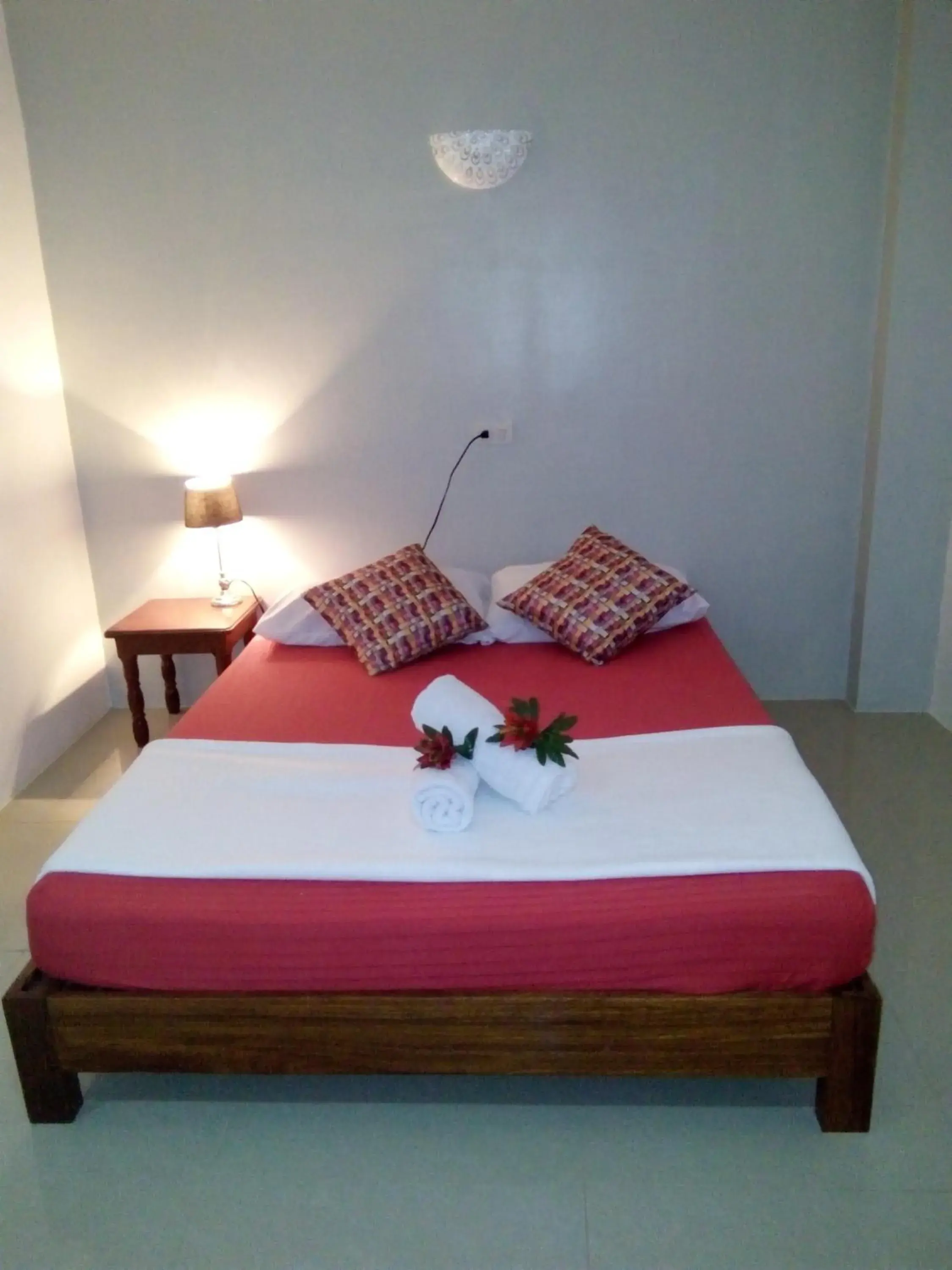 Bed in La Casa Teresa Tourist Inn Inc