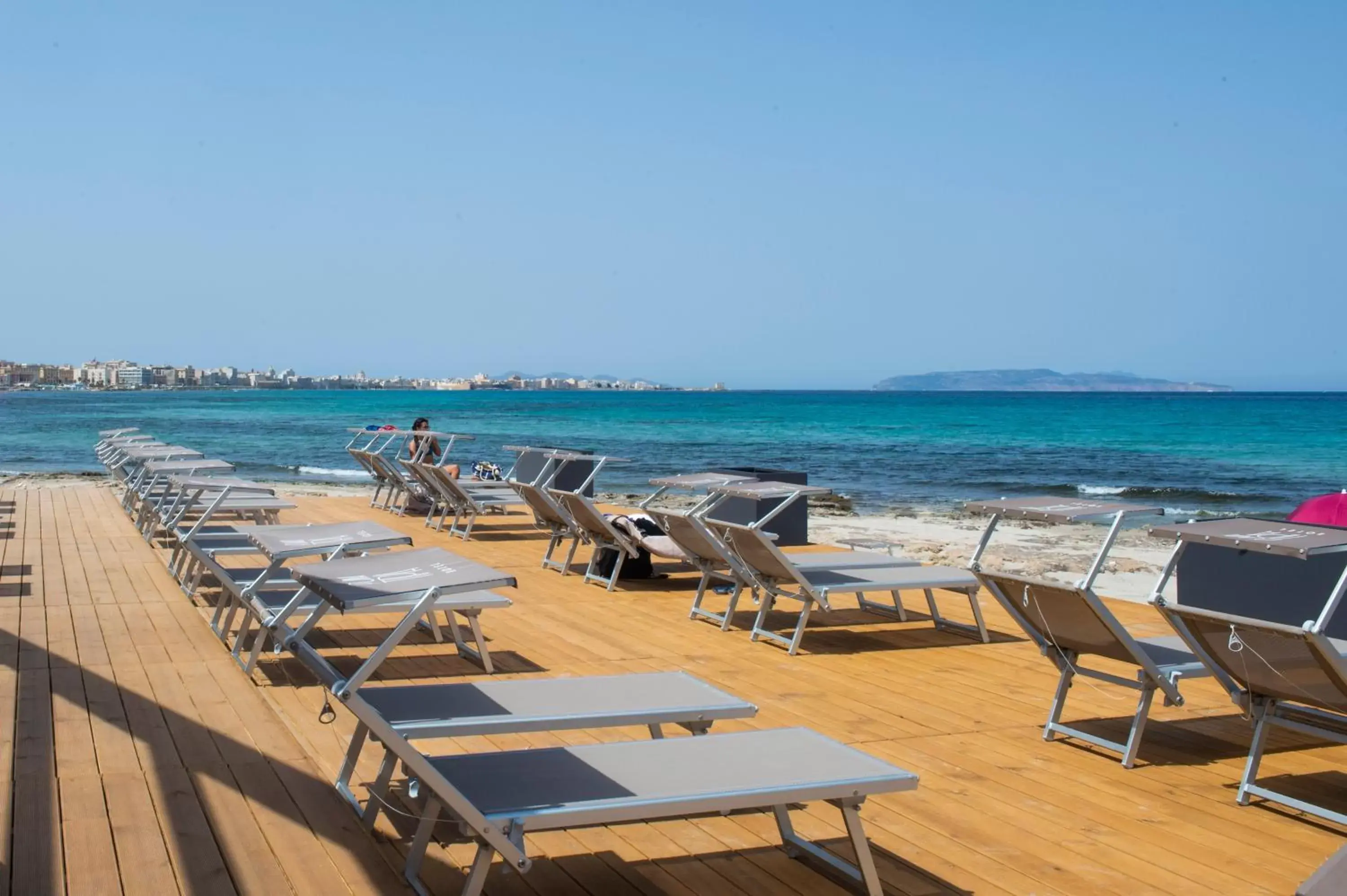 Solarium, Beach in Hotel Punta Tipa