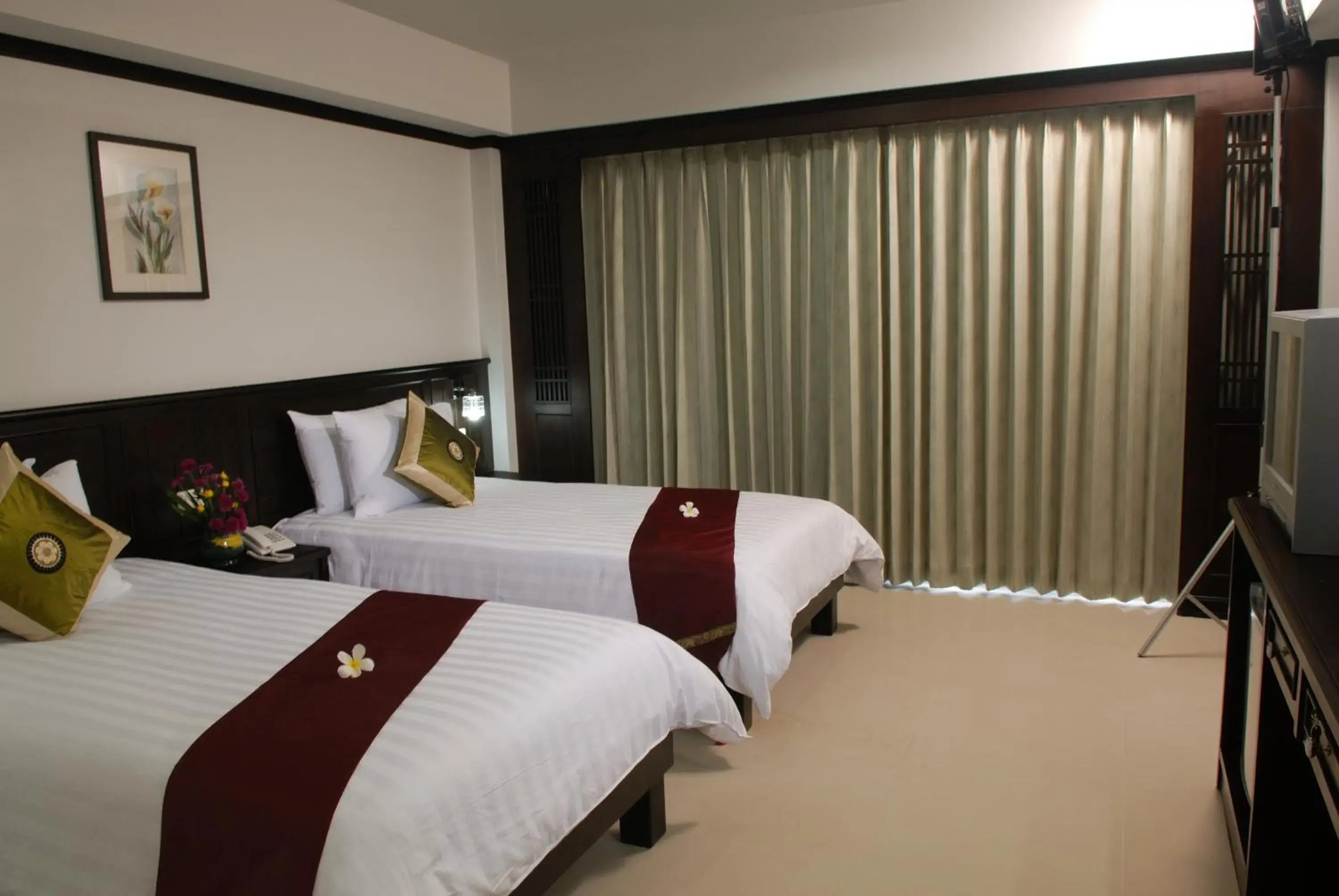 Bed in First Residence Hotel - SHA Plus