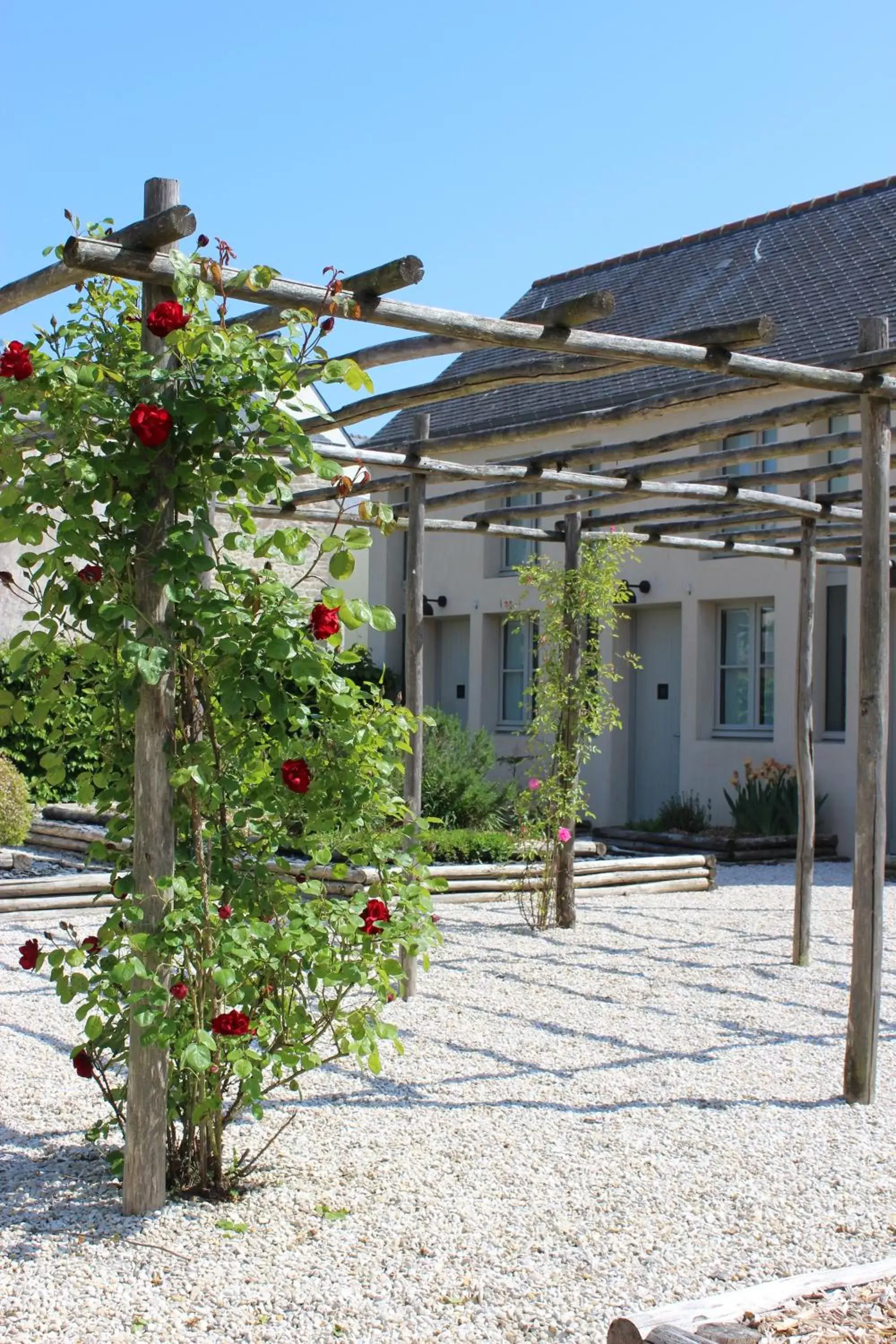 Patio, Property Building in Hôtel Ginkgo - SPA Biloba