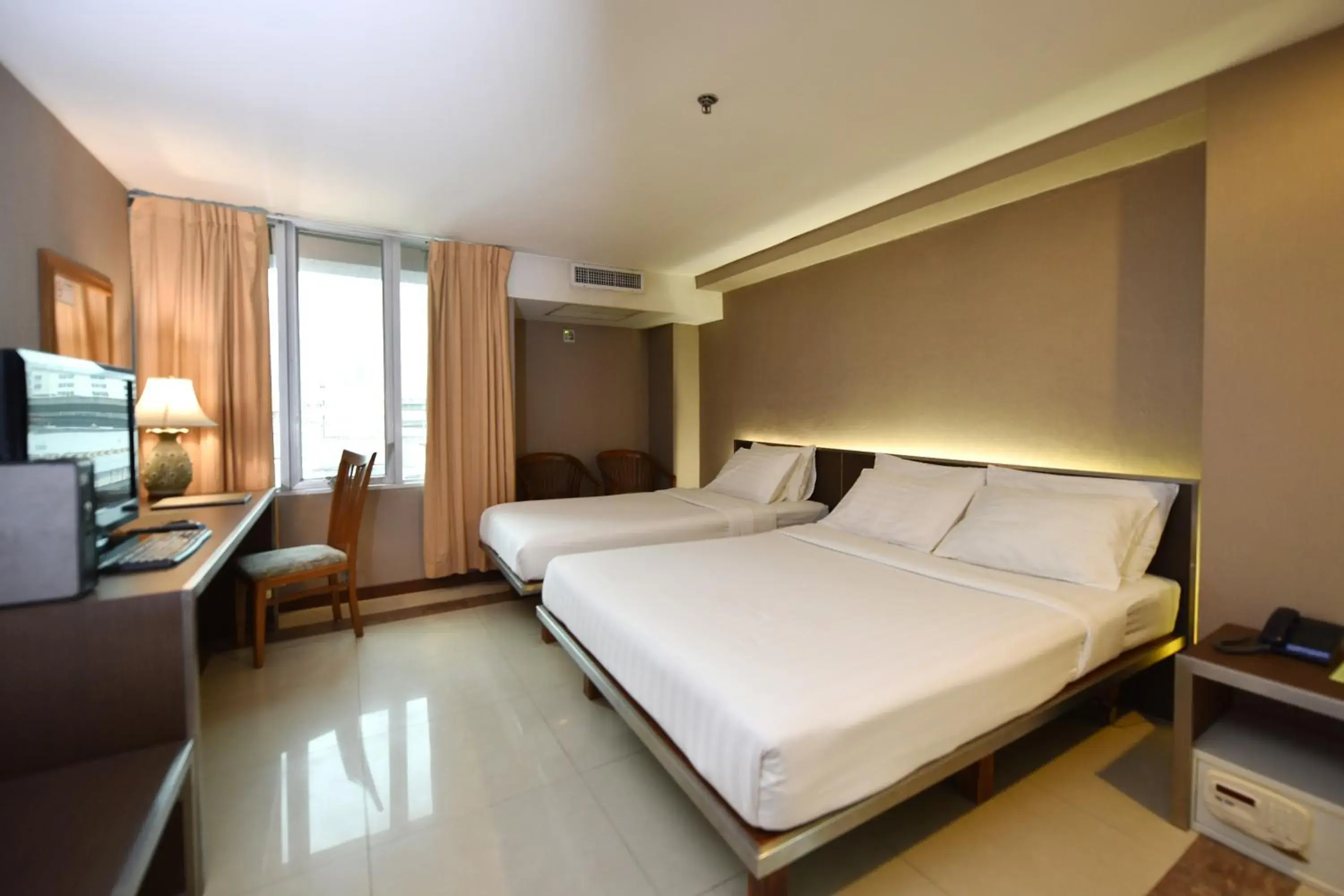 Bed in Bangkok City Suite