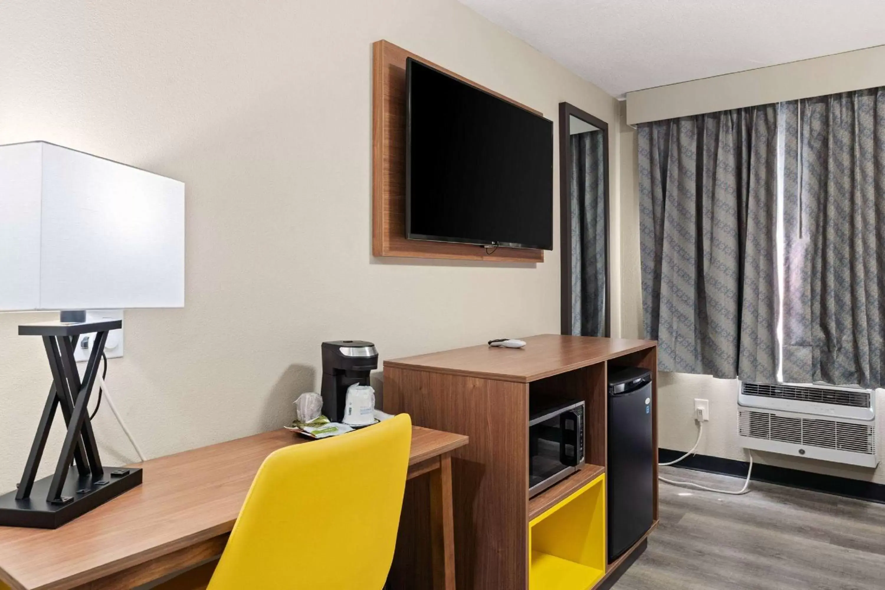 Photo of the whole room, TV/Entertainment Center in Days Inn by Wyndham Albuquerque I-25