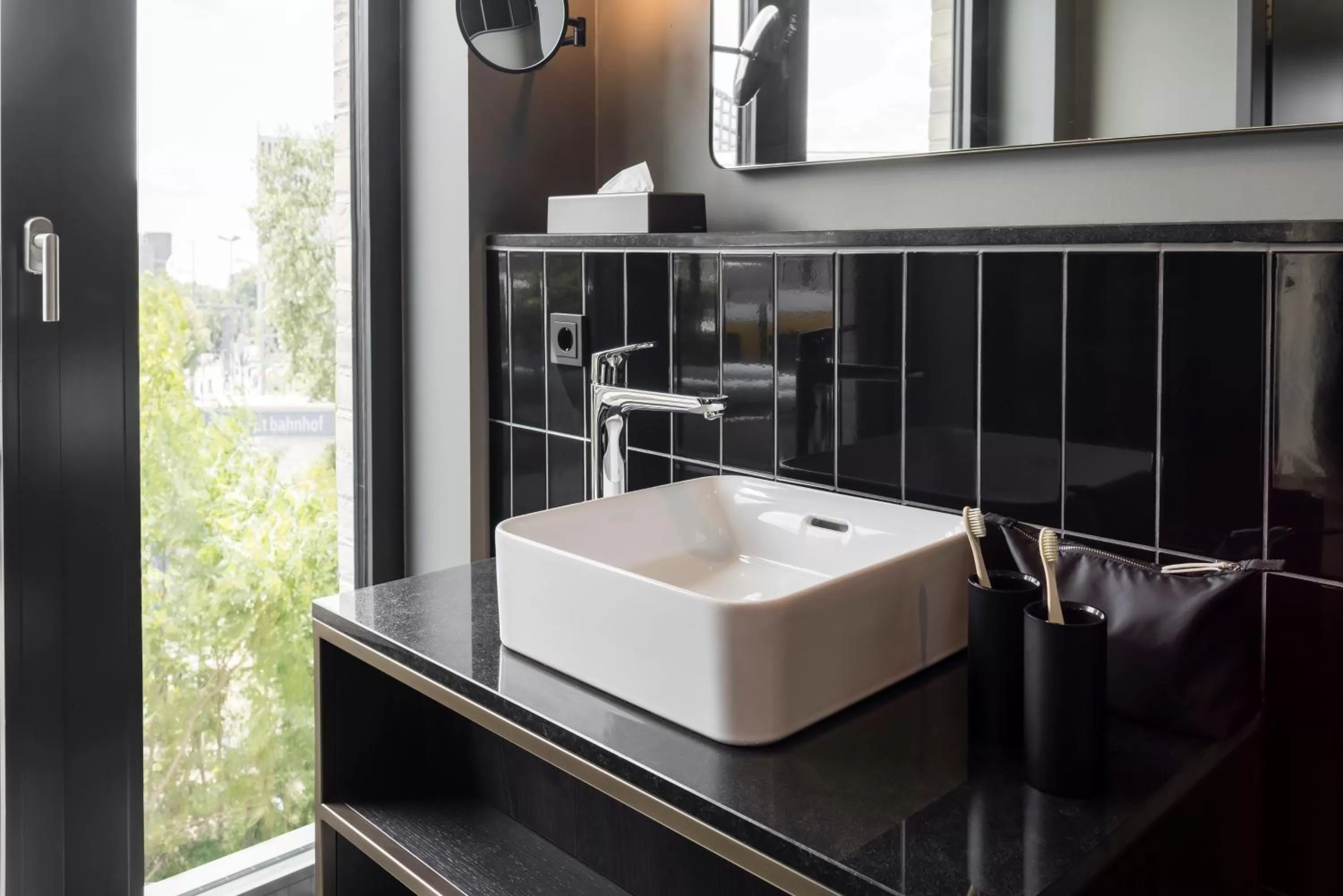 Bathroom in Hotel ROMY by AMANO