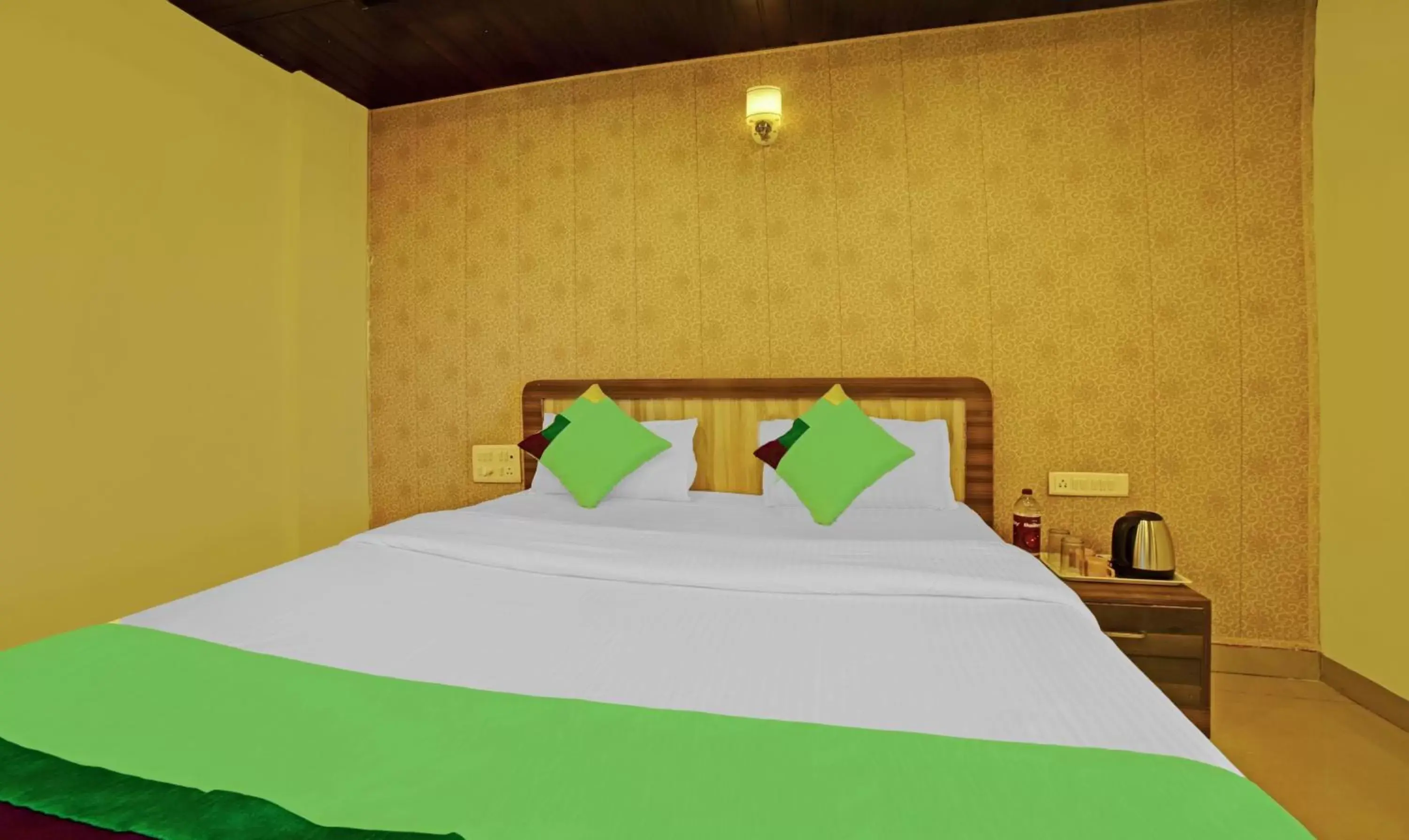 Bedroom, Bed in Treebo Balaji Excellency with Pool & Spa Bedroom, Bed in Treebo Balaji Excellency with Pool & Spa