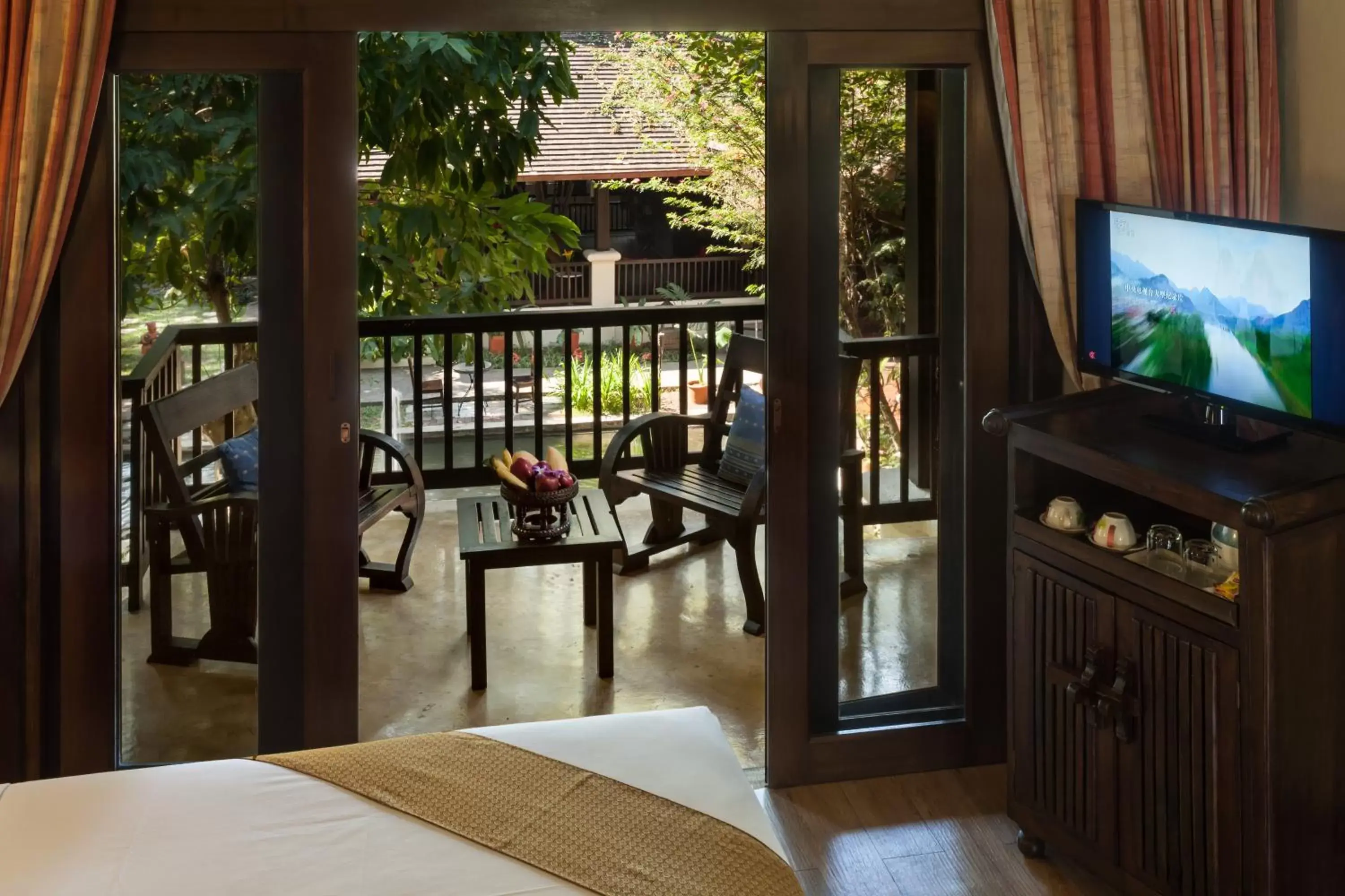 Balcony/Terrace, TV/Entertainment Center in Lanna Dusita Riverside Boutique Resort