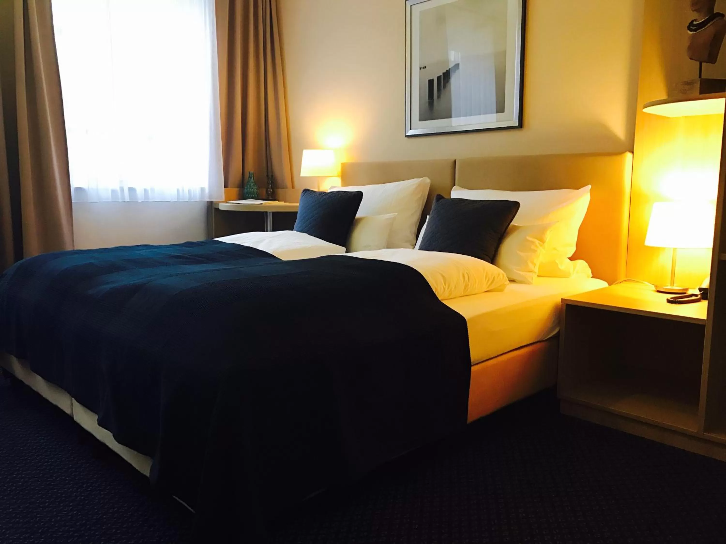 Bed in ONNO Boutique Hotel & Apartments