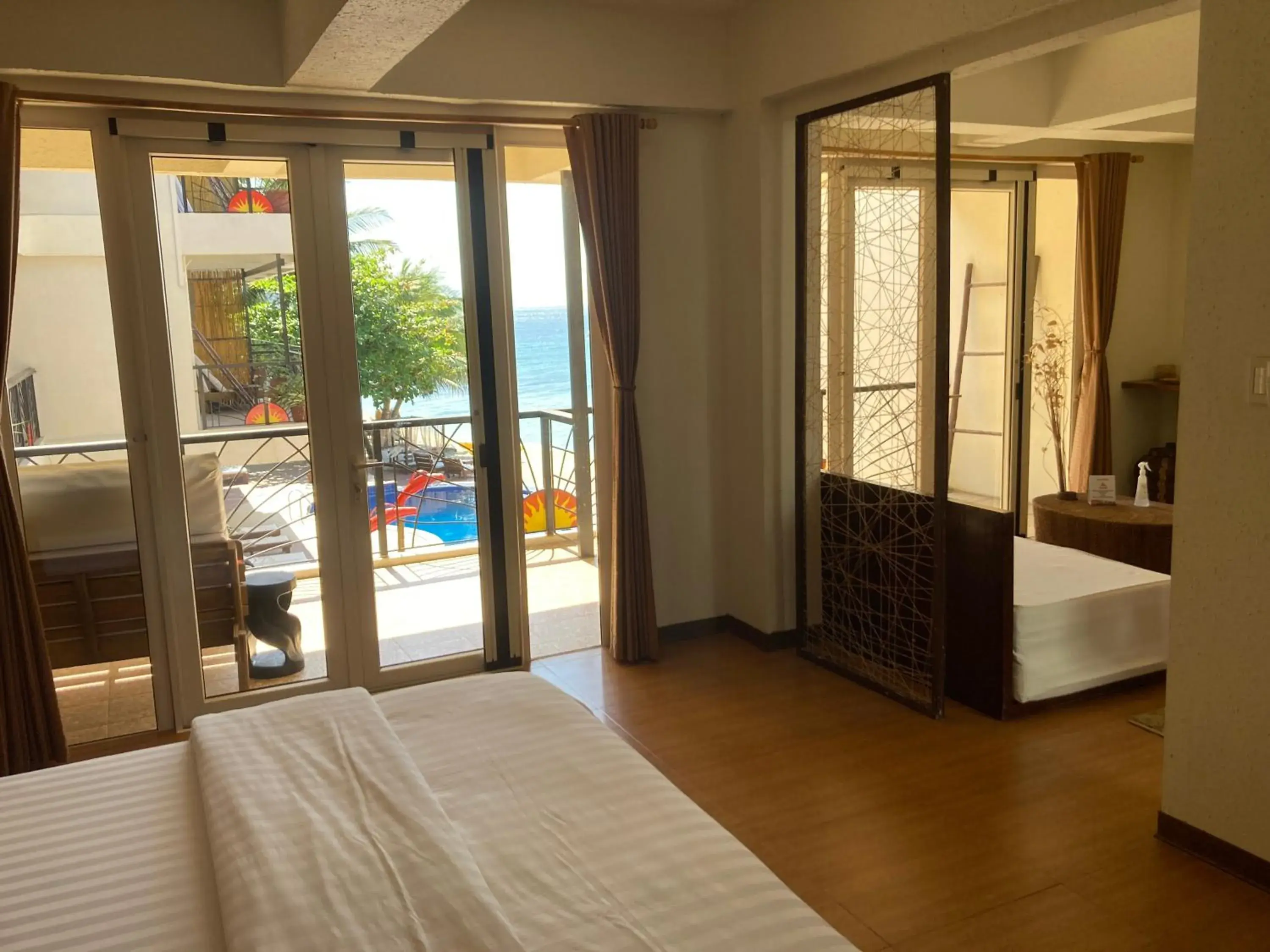 Photo of the whole room, Pool View in Sunset At Aninuan Beach Resort