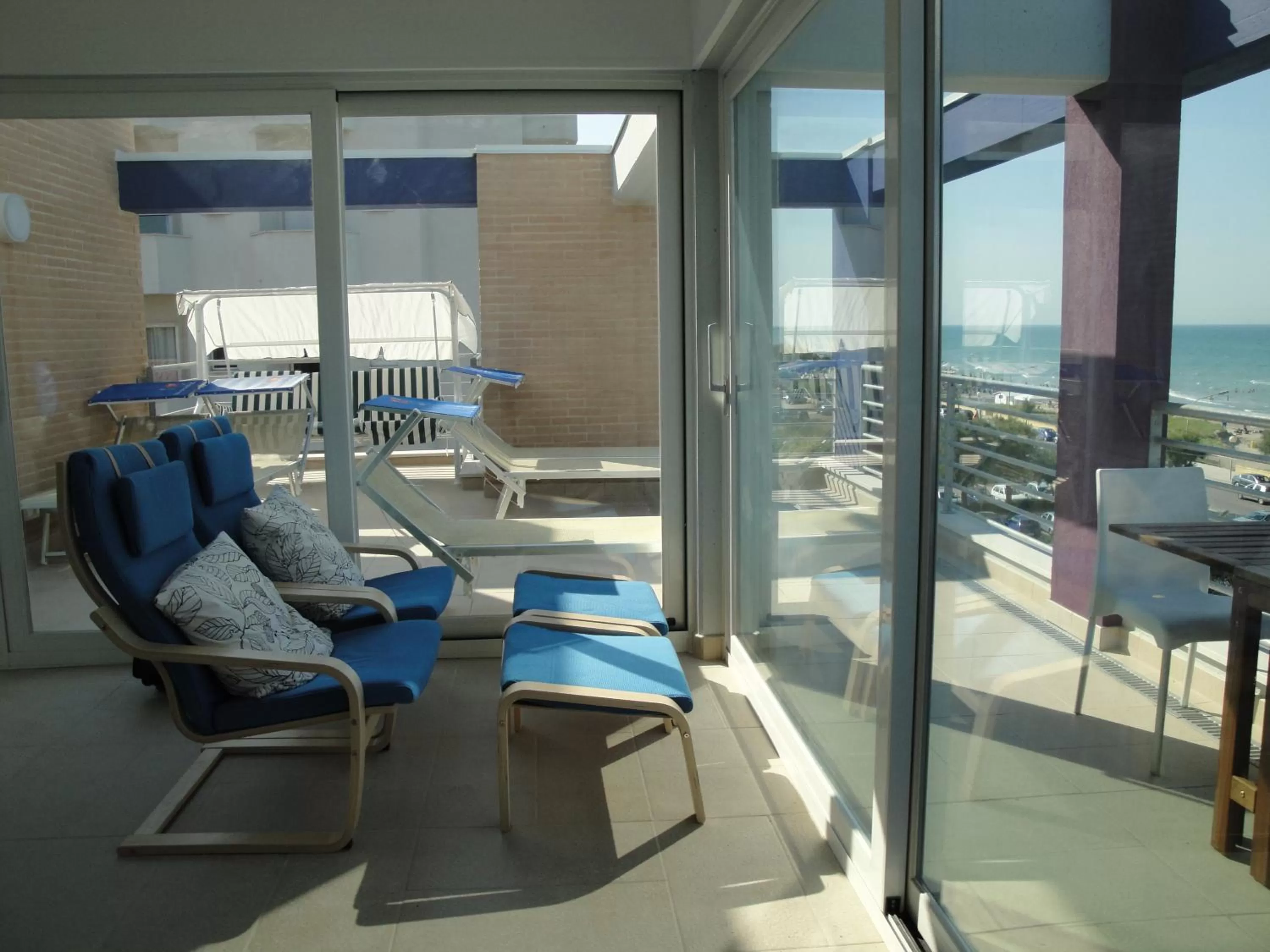 Communal lounge/ TV room in Residence La Nave