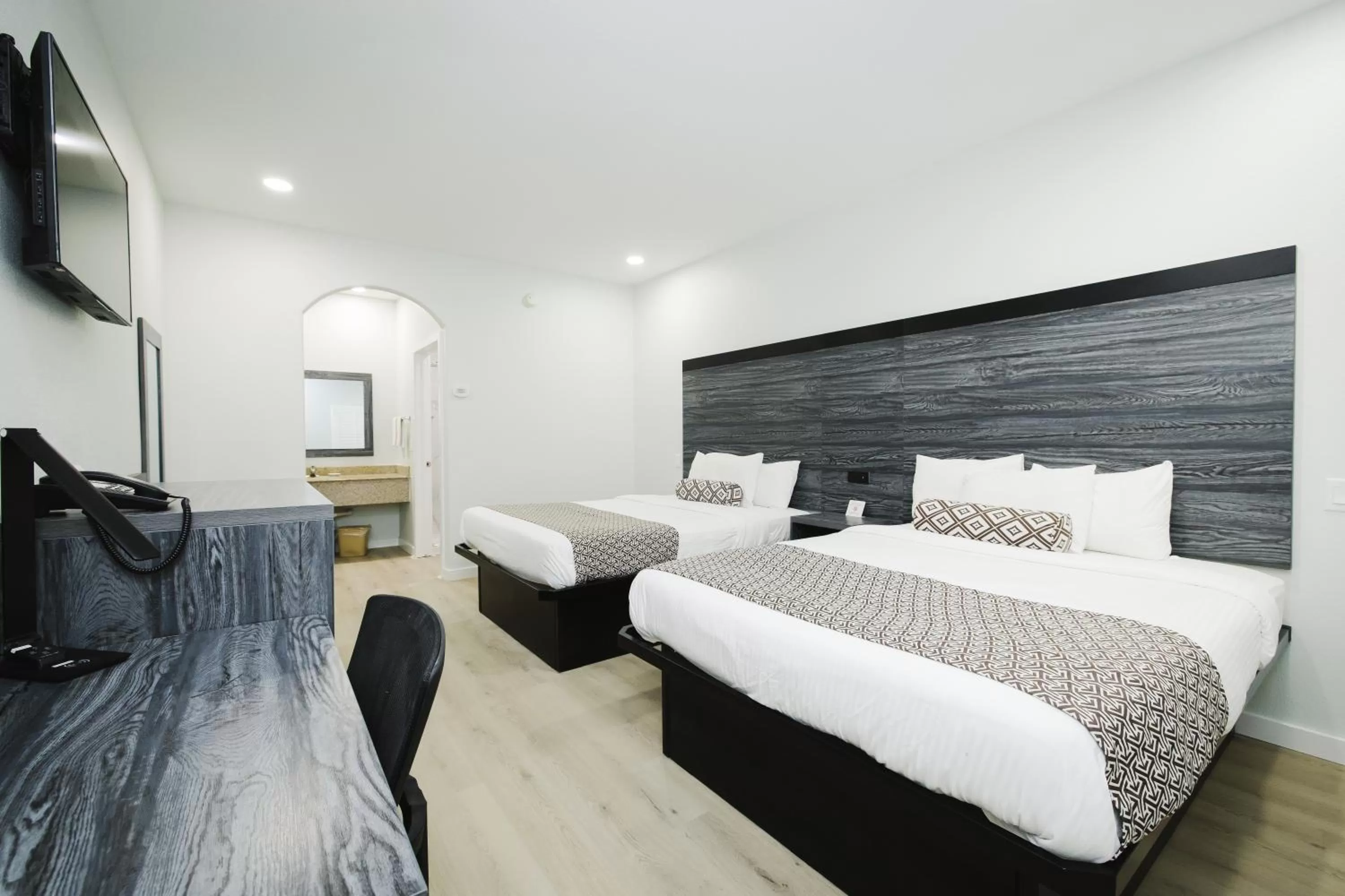 Bed in Sapphire Inn & Suites