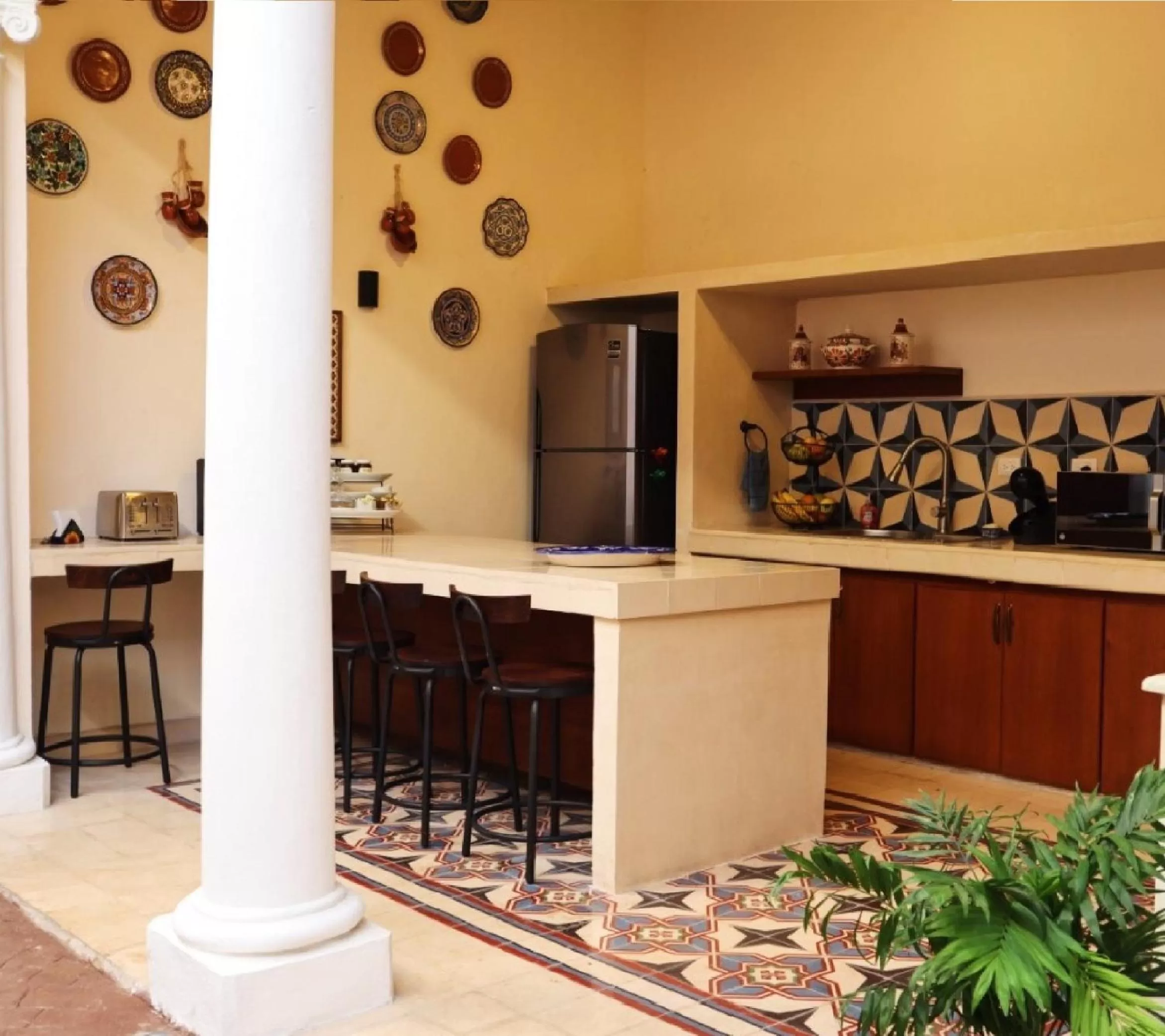 Kitchen or kitchenette in Hotel & Hostal Boutique Casa Garza