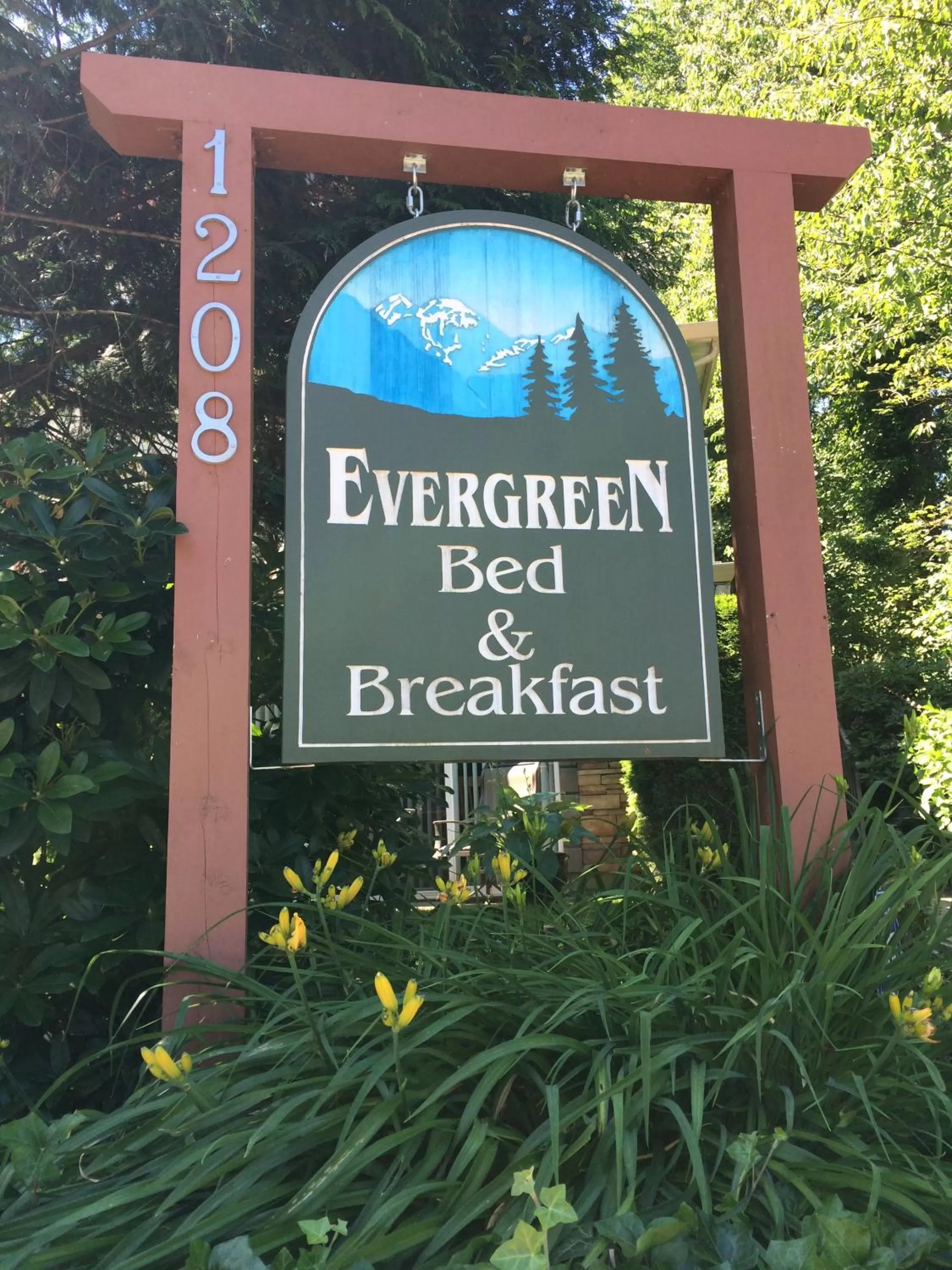 Property logo or sign in Evergreen Bed & Breakfast