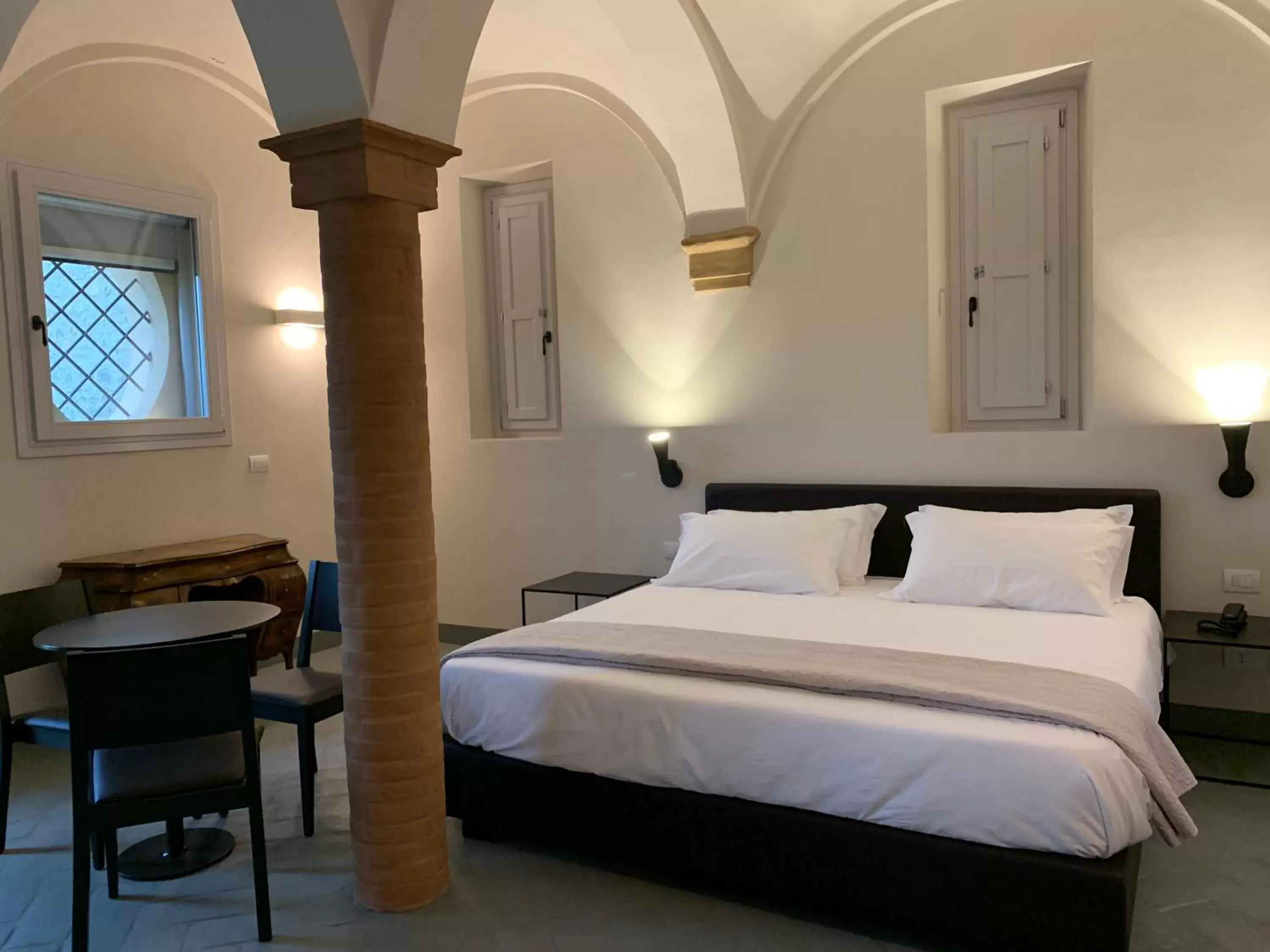 Bed in PALAZZO DE' ROSSI HOTEL