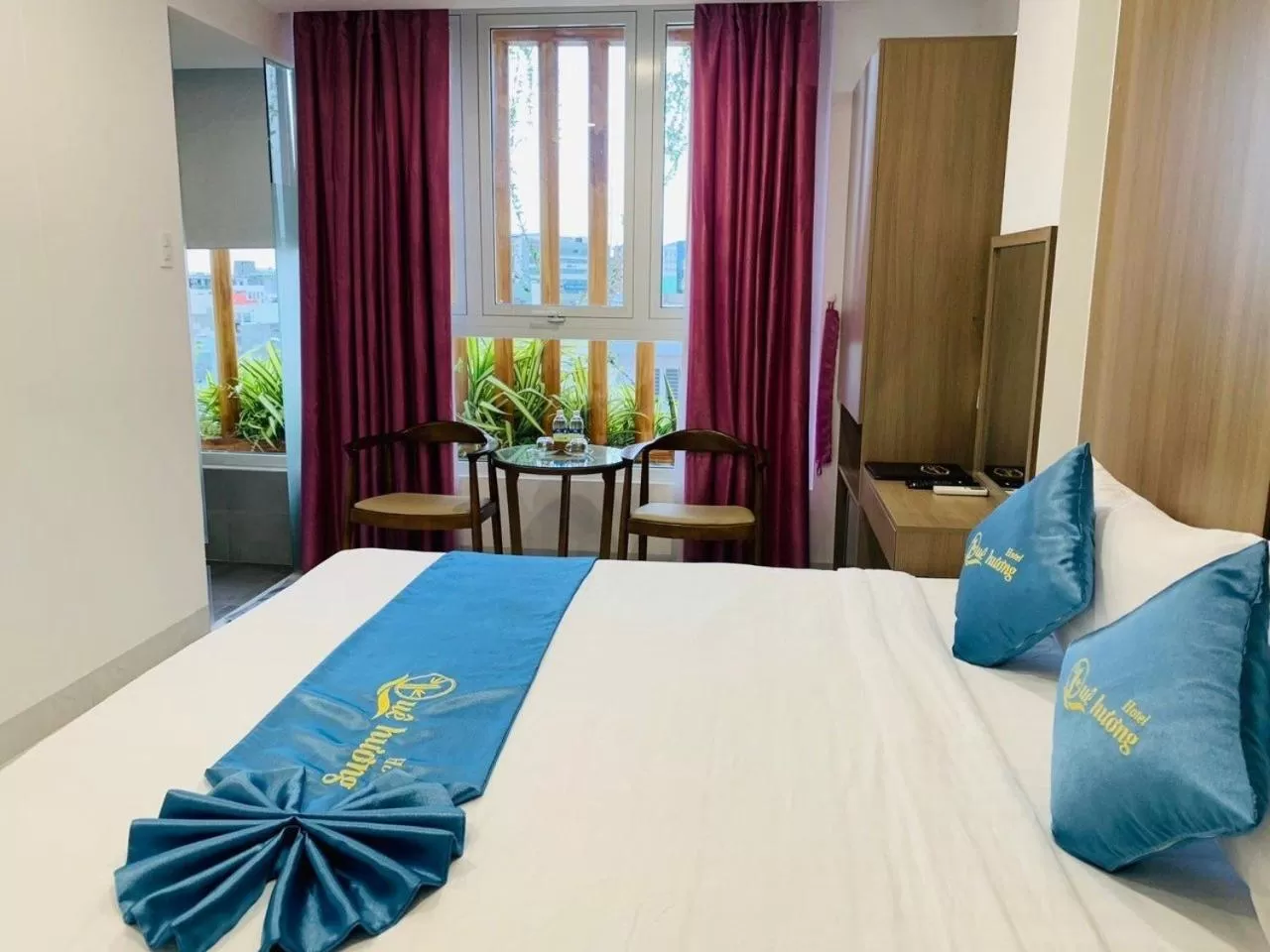 Bed in QUE HUONG HOTEL