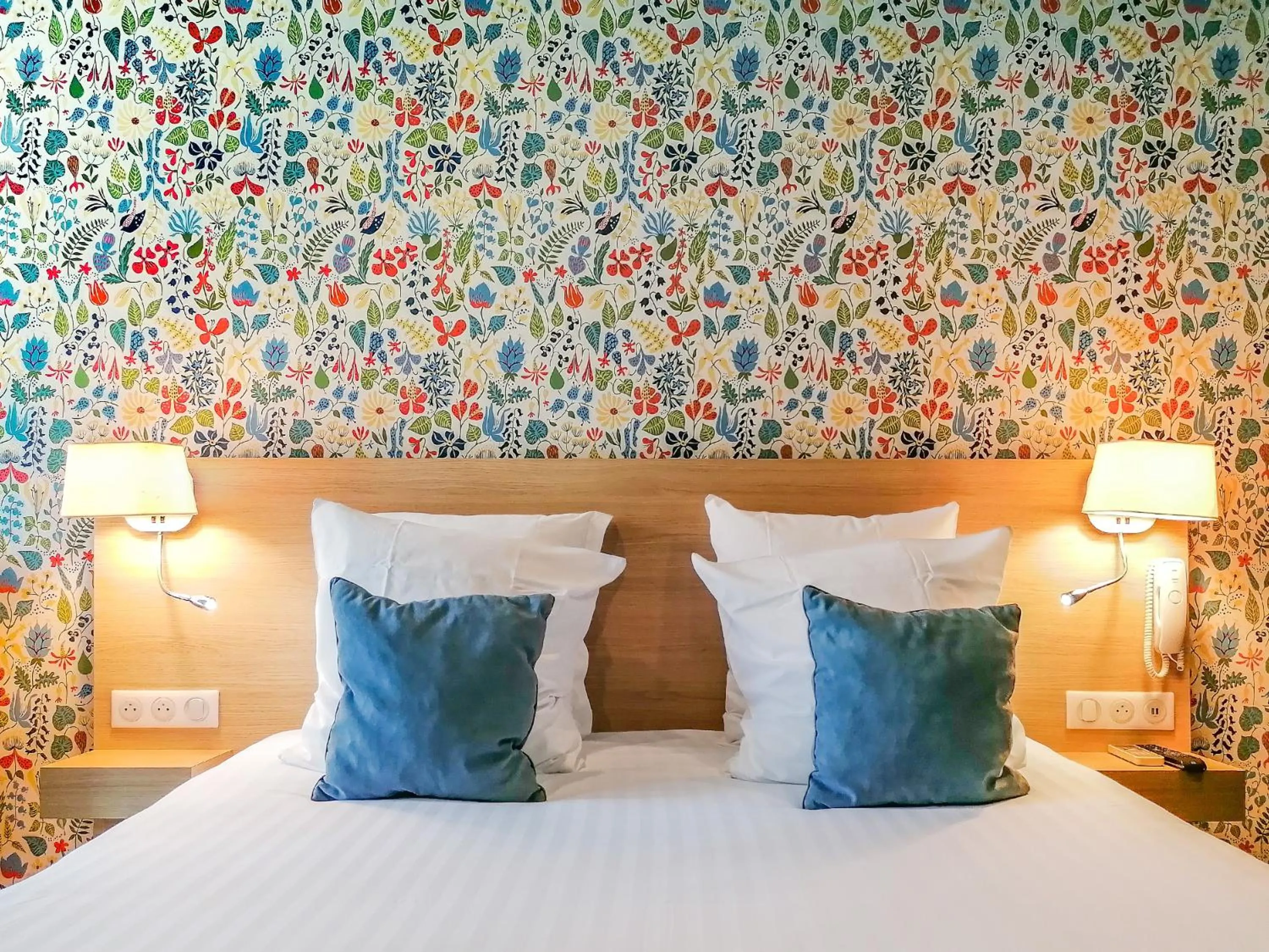 Bed in Hôtel Du Centre, un hôtel AMMI