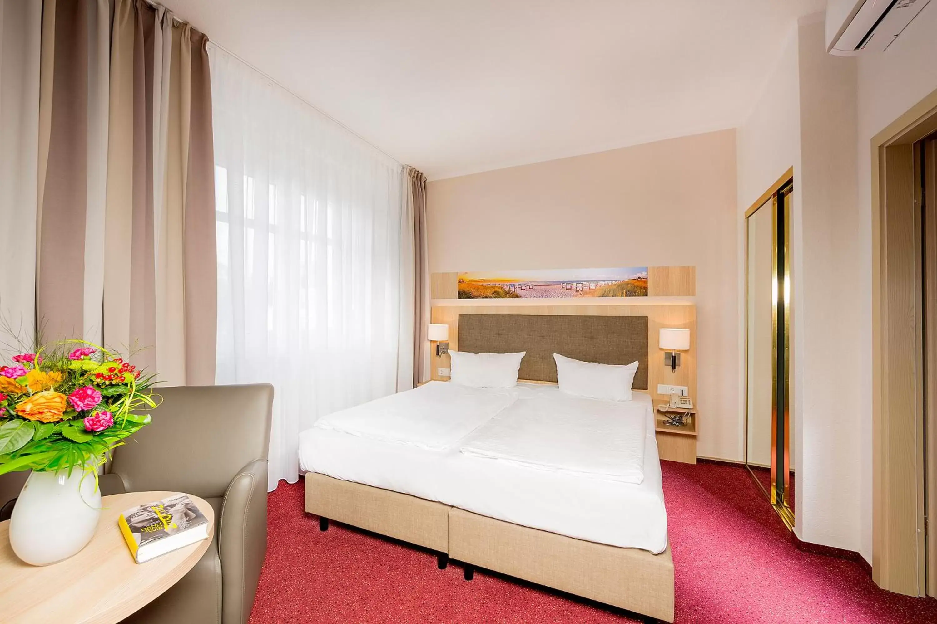 Bed in Garni Eden Hotels