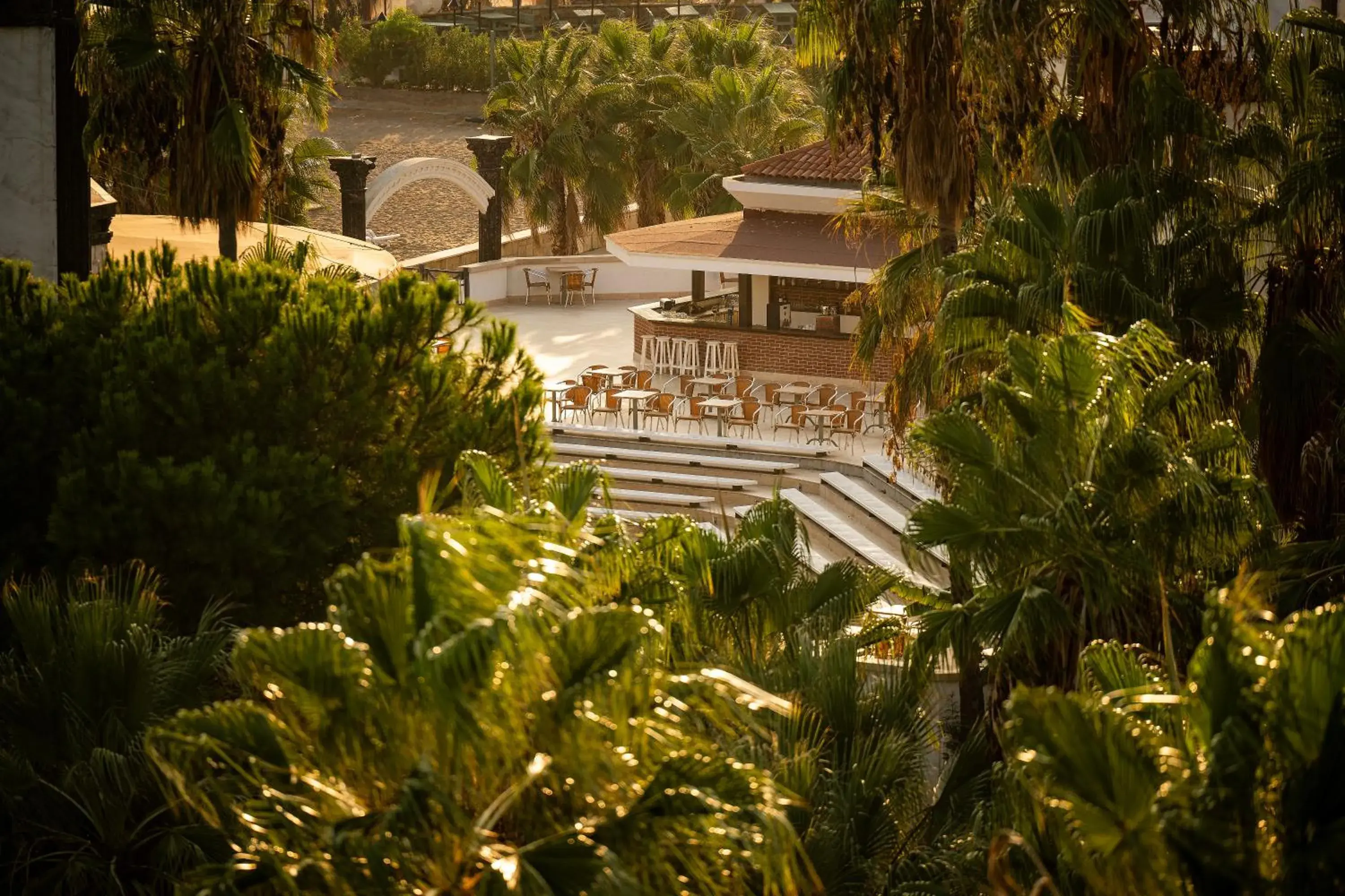 Lounge or bar, Pool View in Adora Golf Resort Hotel