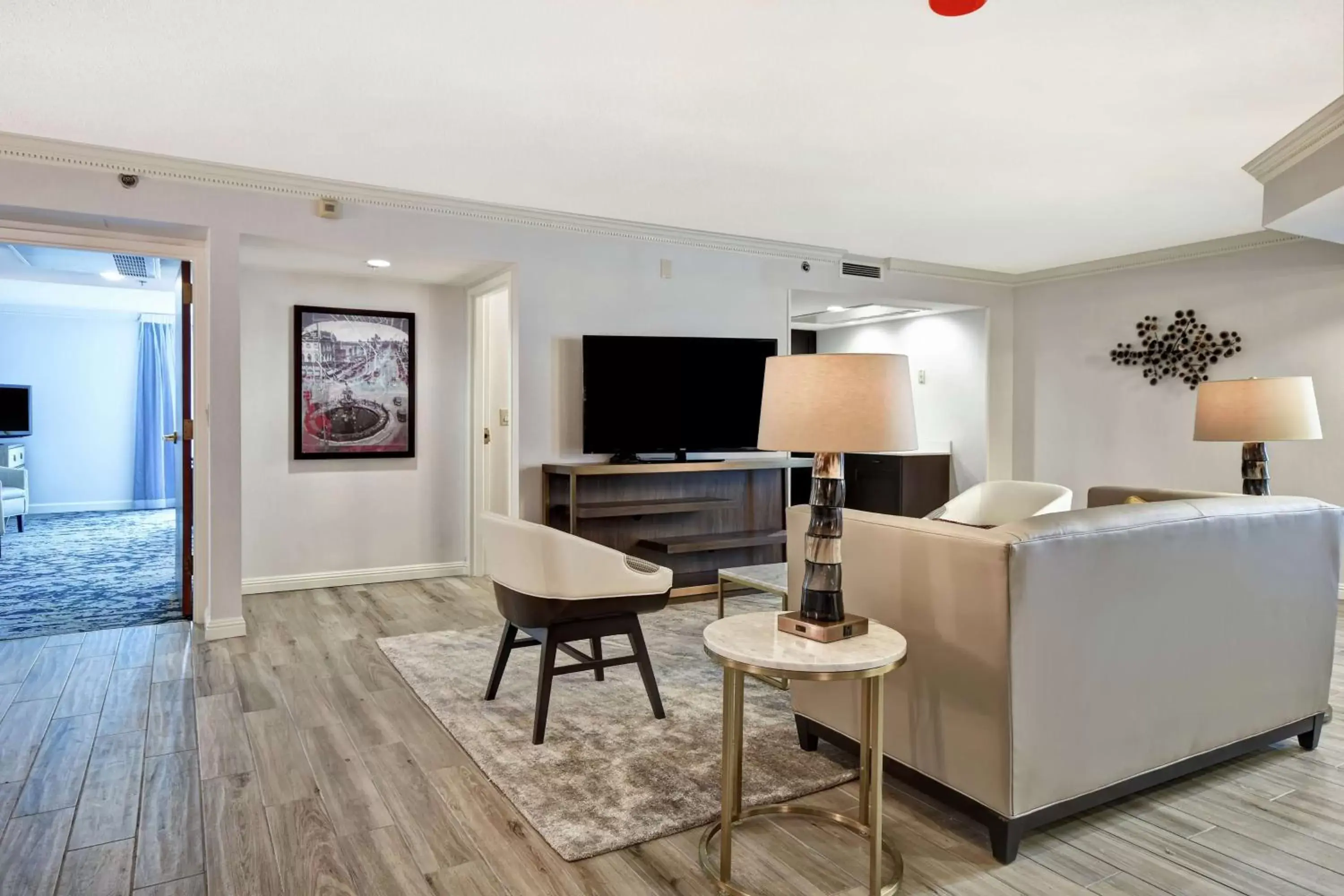 Living room, TV/Entertainment Center in Embassy Suites Montgomery - Hotel & Conference Center