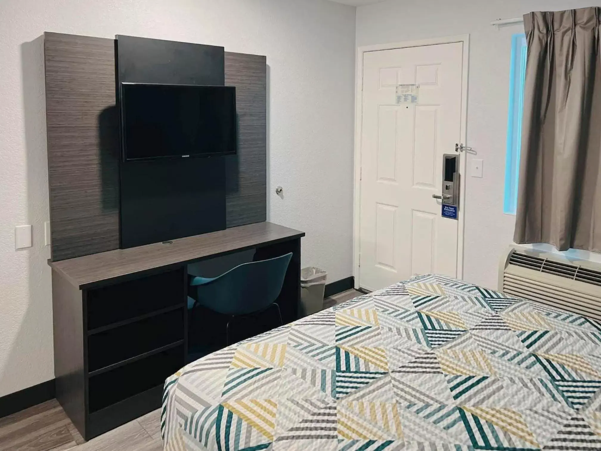 Bed, TV/Entertainment Center in Motel 6-Marina, CA - Monterey