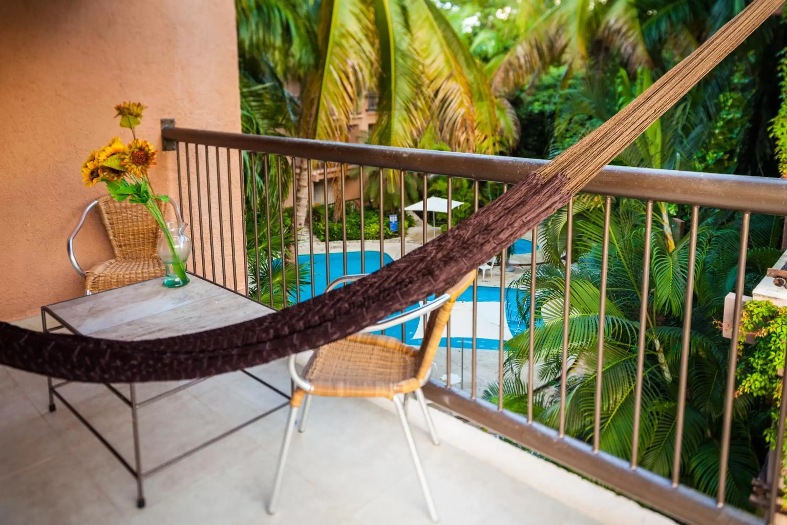 Balcony/Terrace, Pool View in Tukan Hotel Playa del Carmen