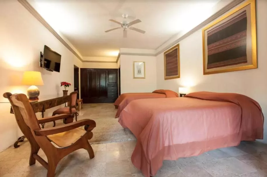 Bed in Orchidelirium Casa Hotel & Salud Estética