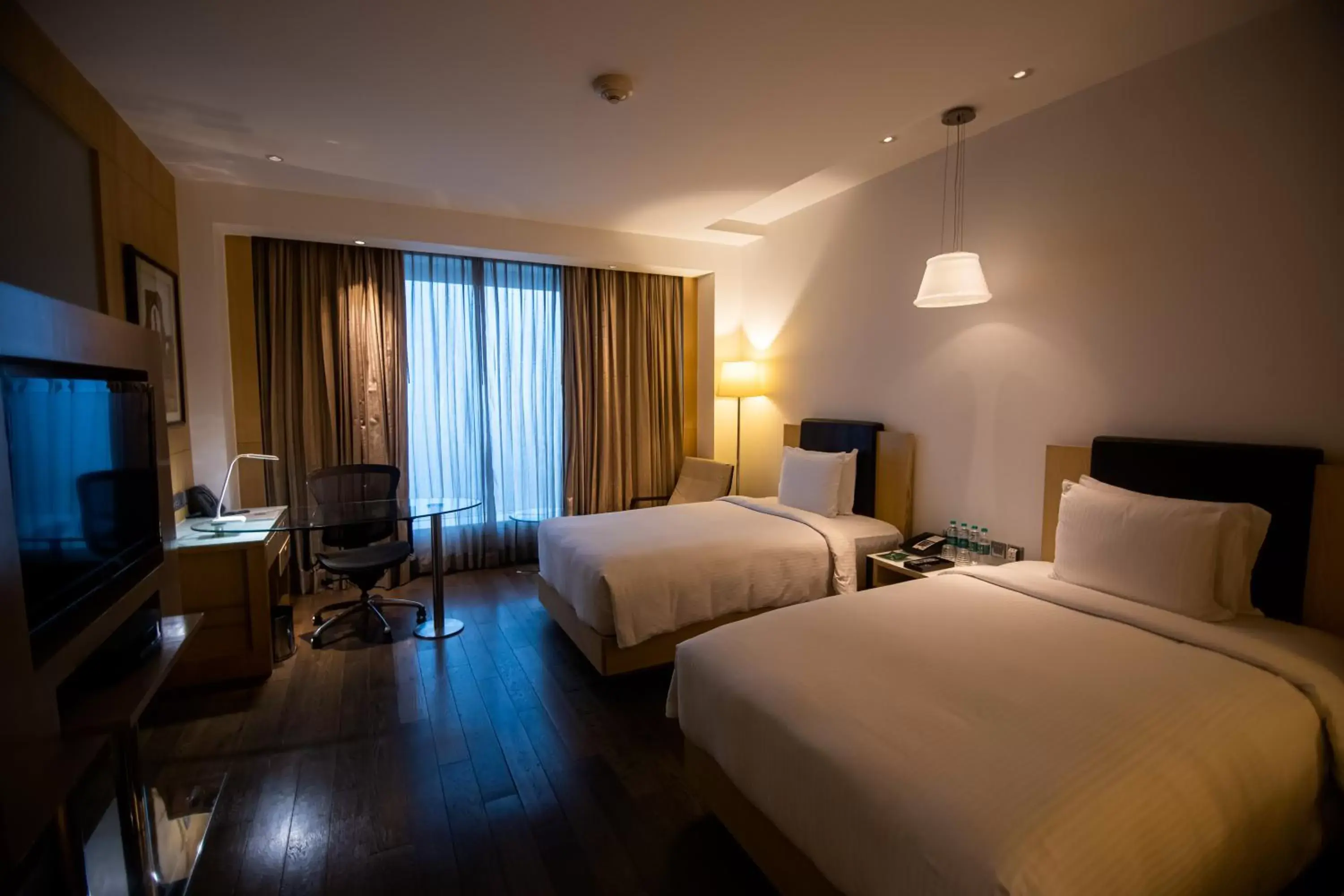 Bed in Crowne Plaza Greater Noida, an IHG Hotel