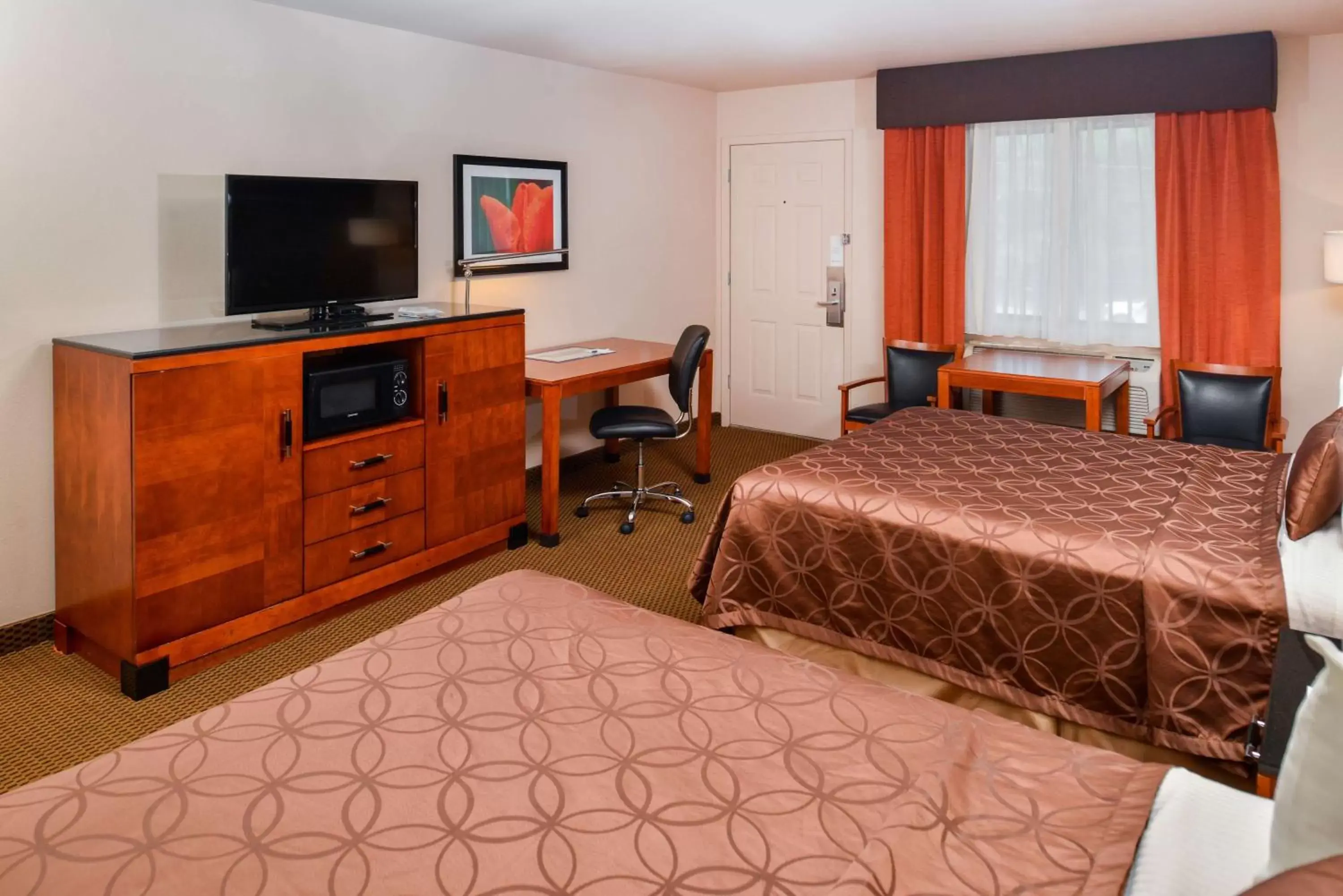 Lobby or reception, Bed in Best Western Executive Inn