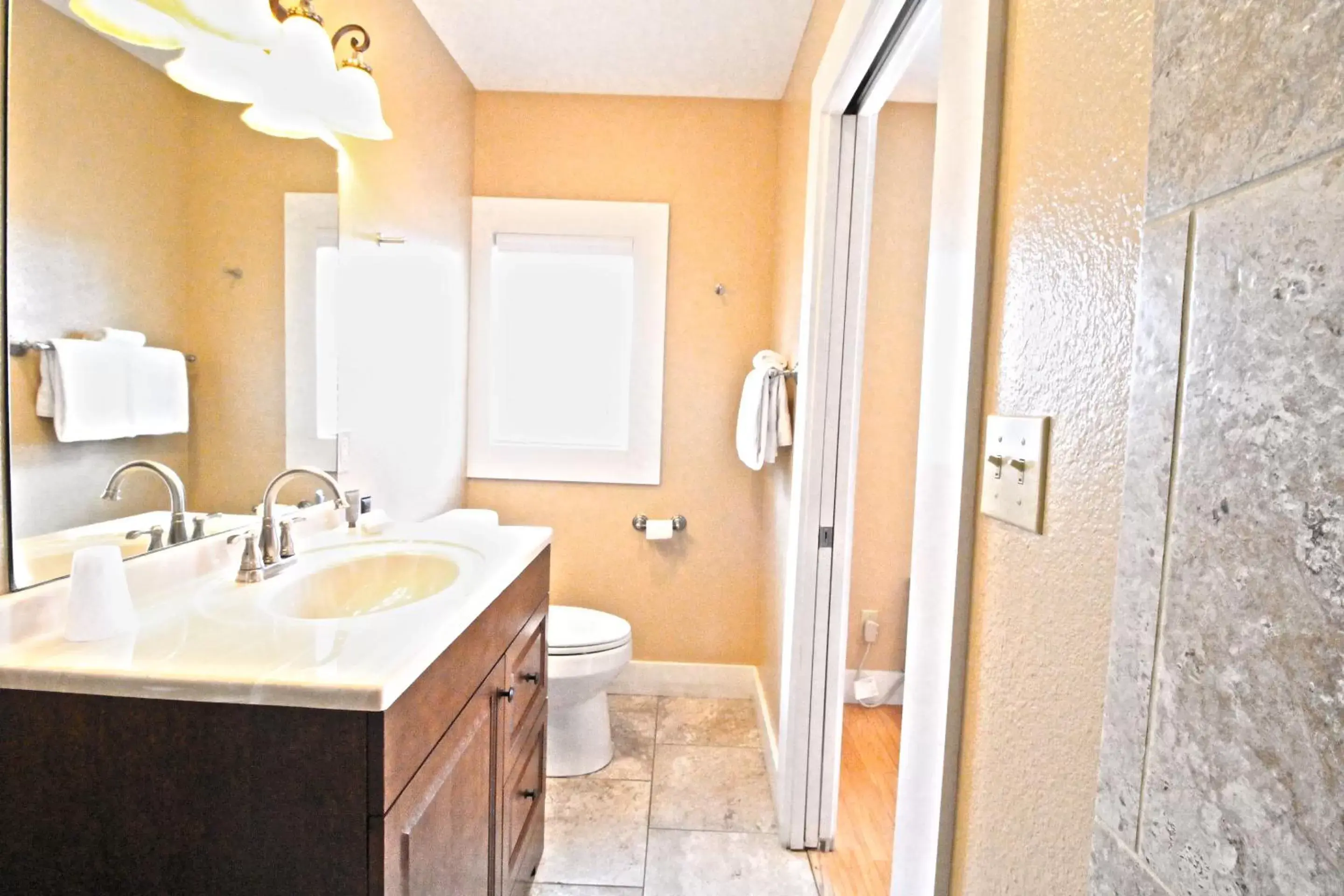 Bathroom in Peach Tree Inn & Suites