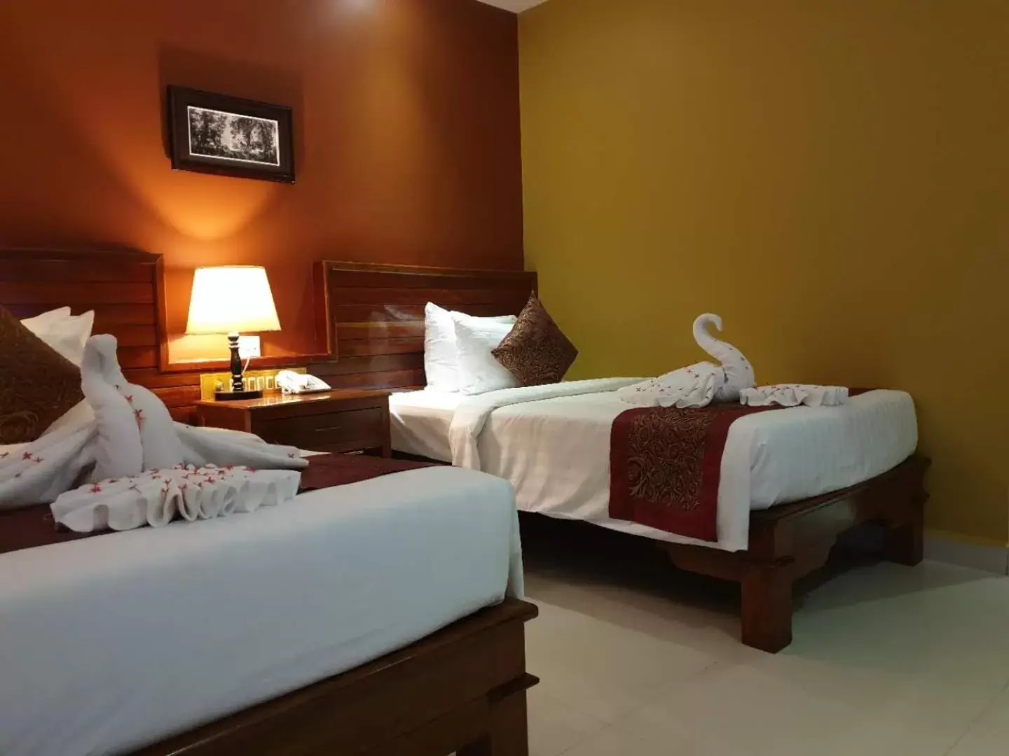 Bed in Aristocrat Residence & Hotel