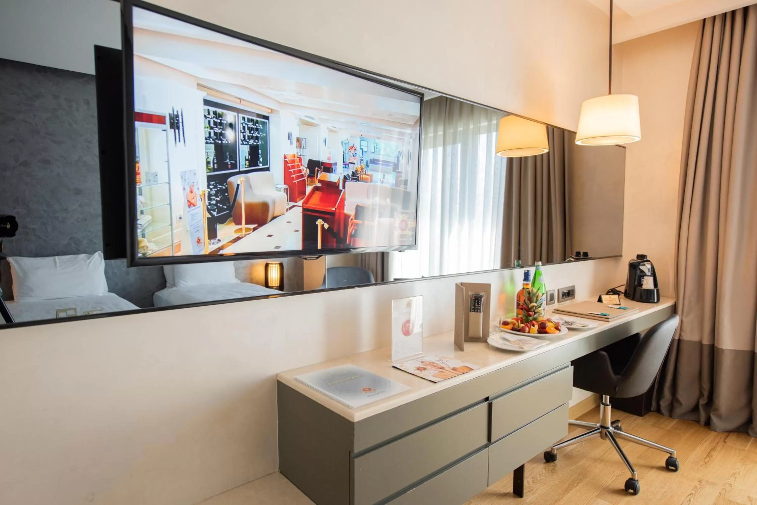 TV and multimedia in Dosso Dossi Hotels & SPA Downtown