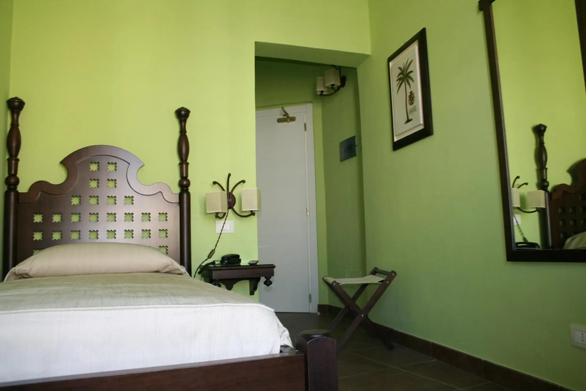 Photo of the whole room, Bed in Hotel dei Coloniali Photo of the whole room, Bed in Hotel dei Coloniali