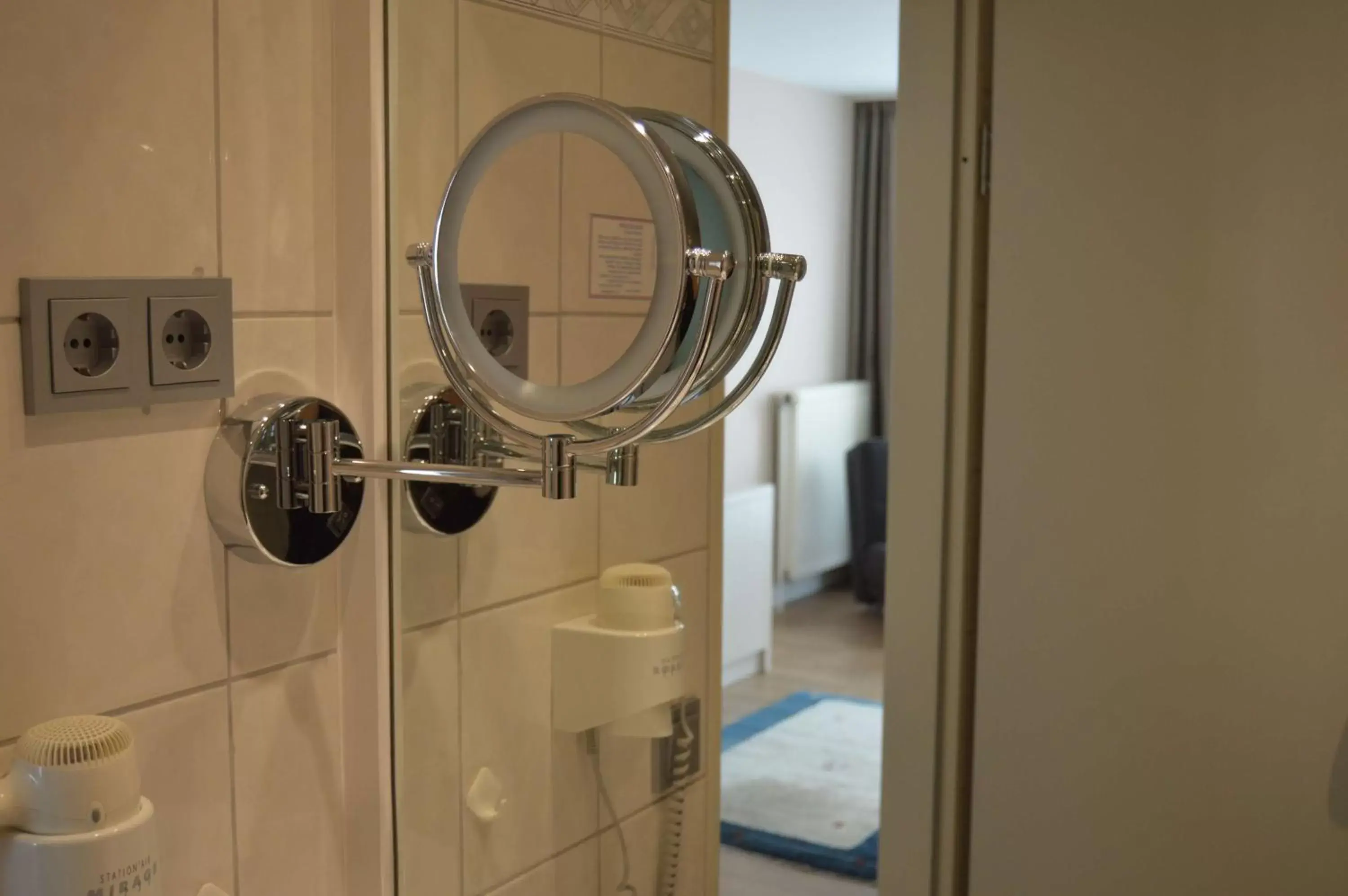 Bathroom in Best Western Plus Theodor Storm Hotel