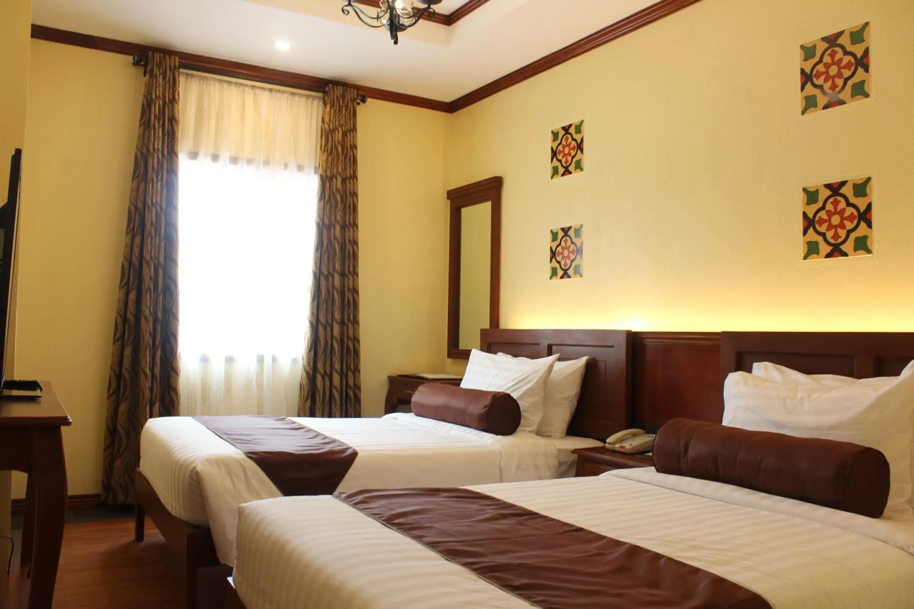 Bed in Sunlight Guest Hotel, Coron, Palawan