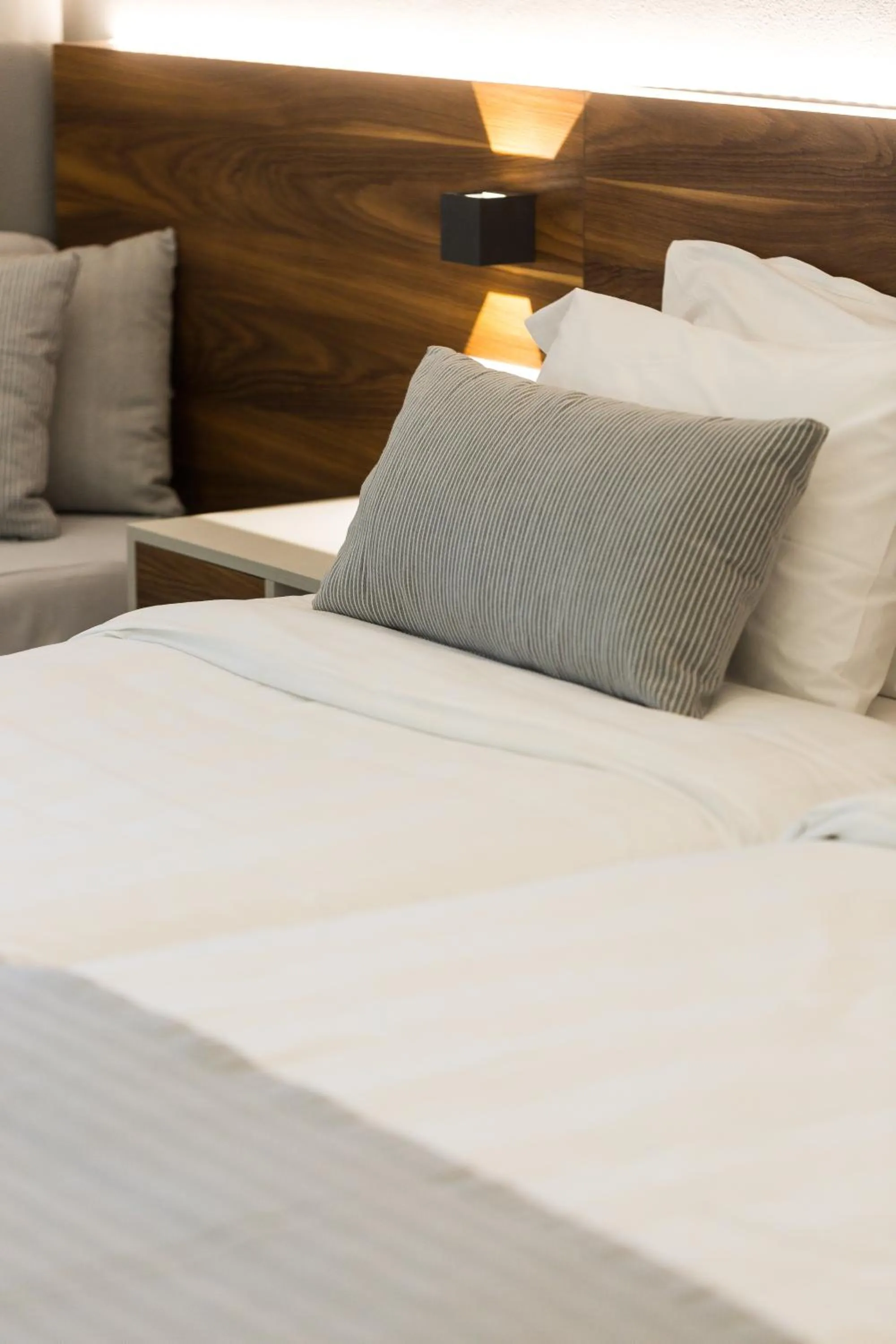 Bed in Atrium Ambiance Hotel