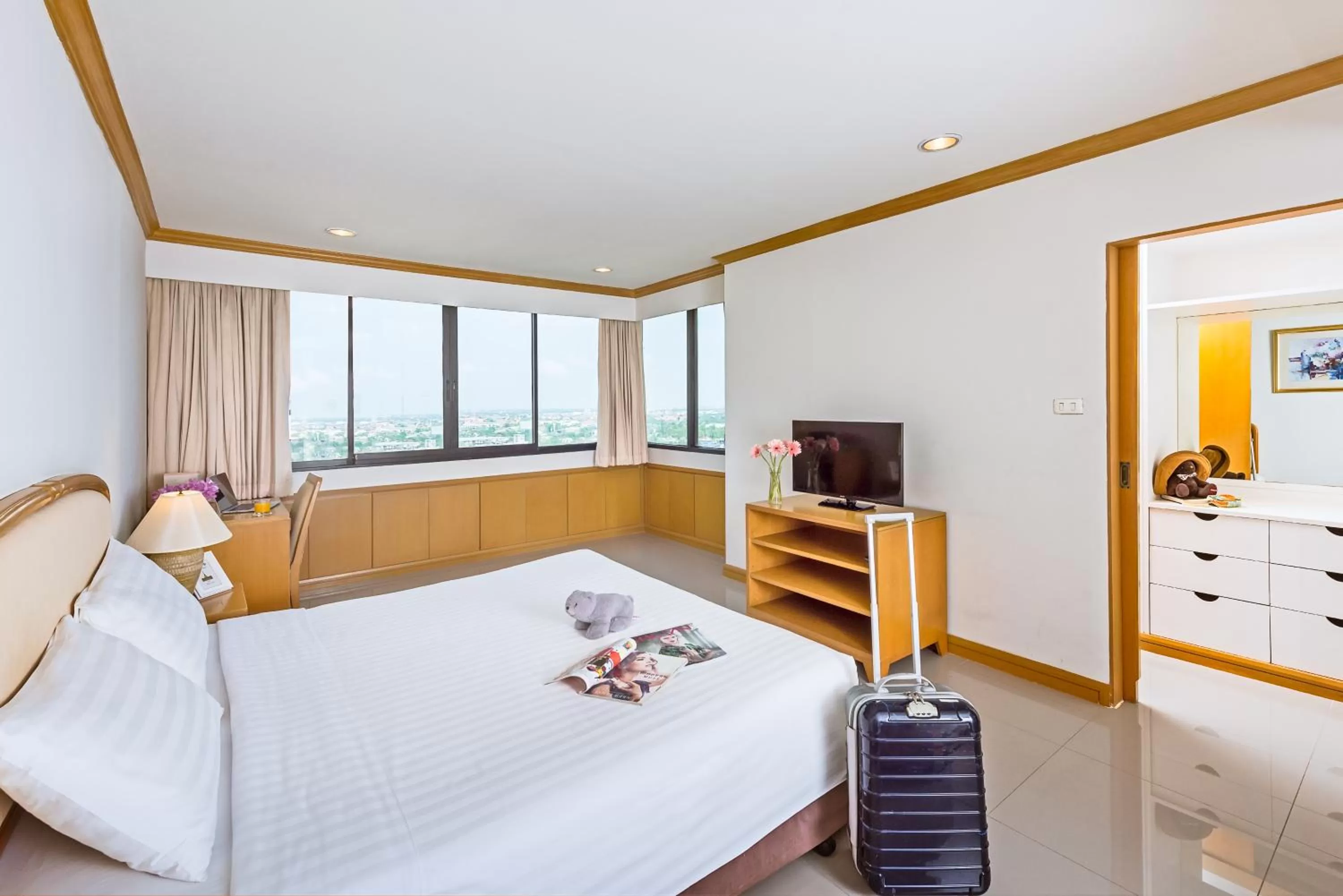 Bed in Riverine Place Hotel and Residence
