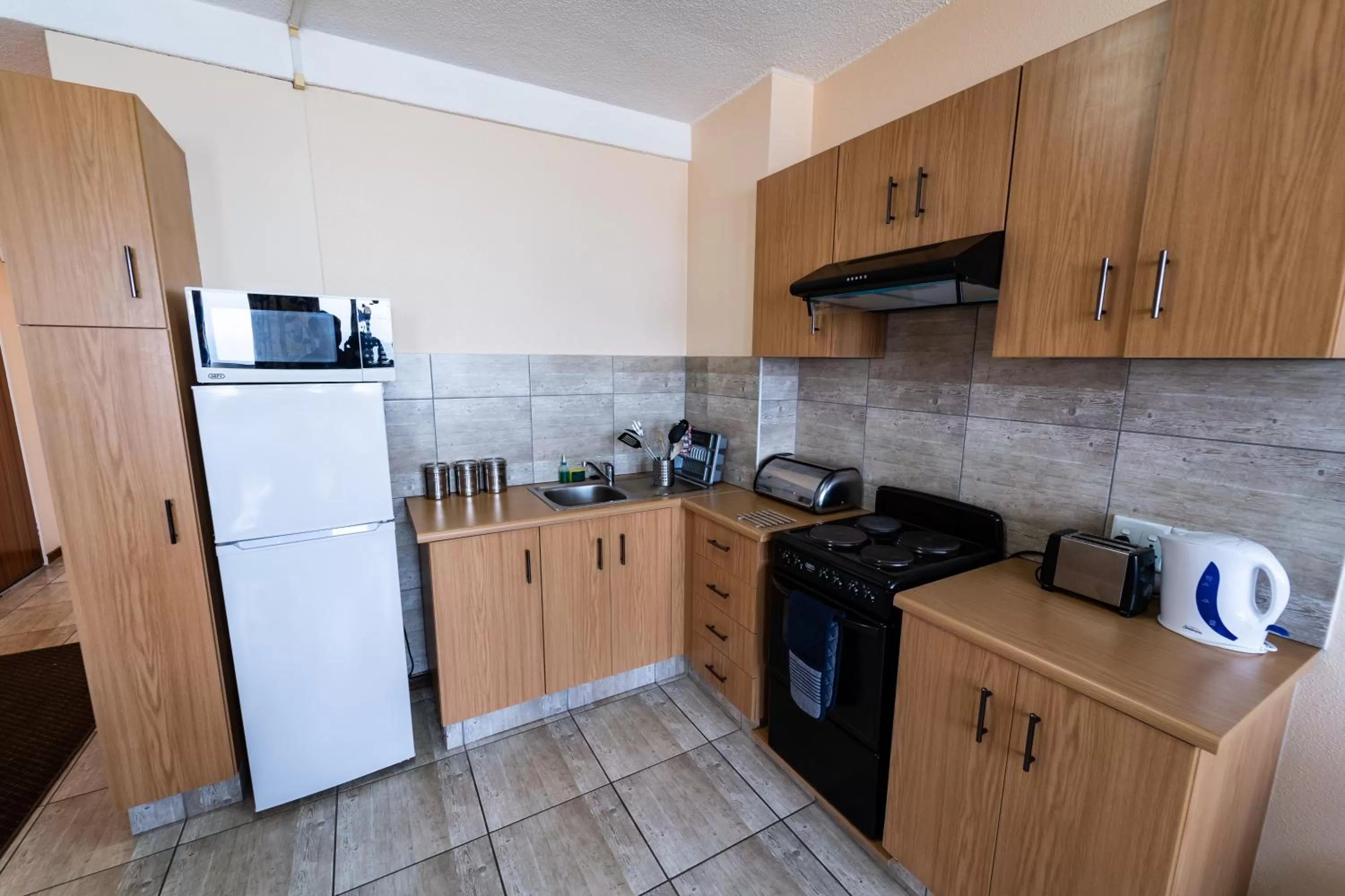 Kitchen or kitchenette in Gooderson Tropicana Hotel