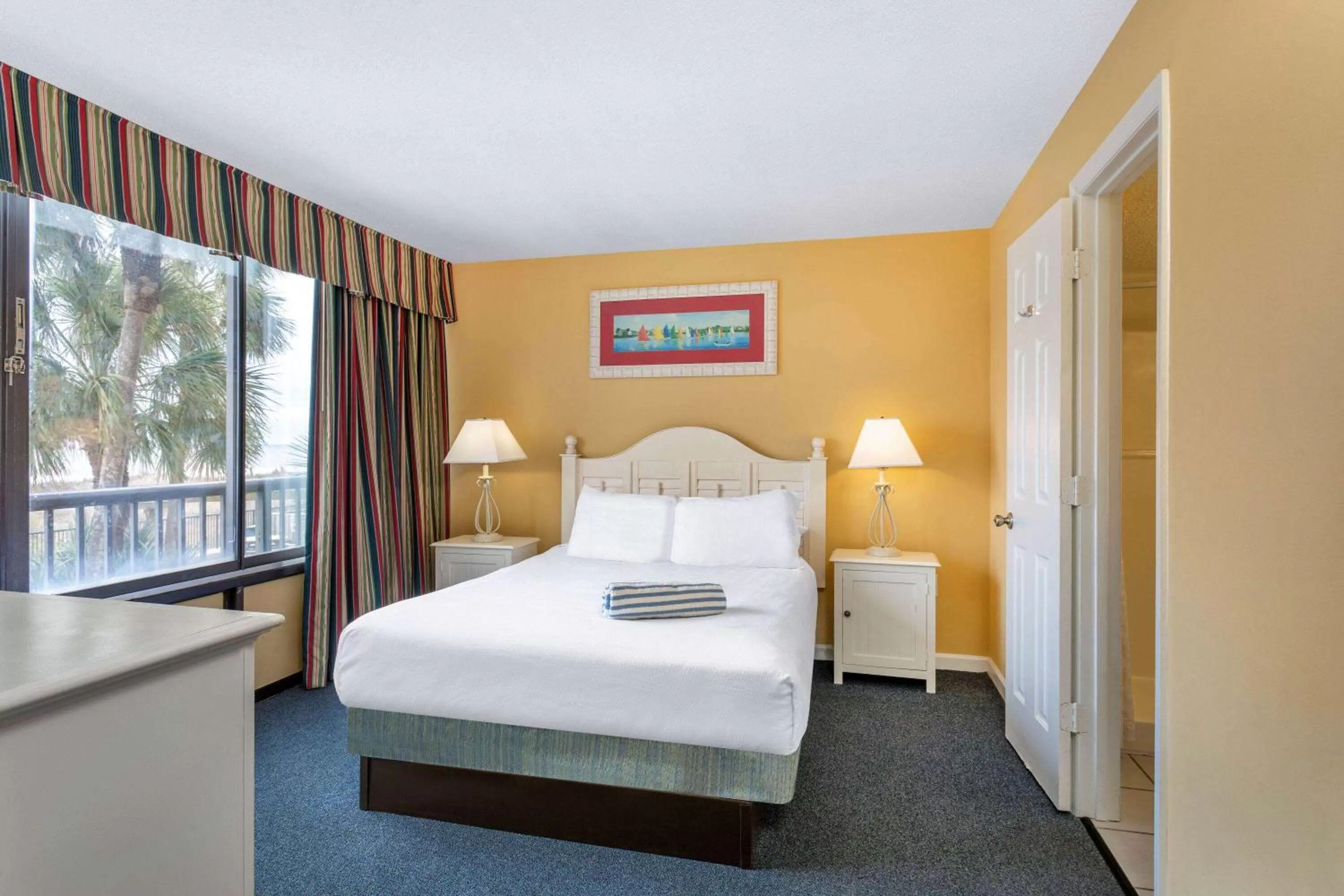 Photo of the whole room, Bed in Ocean Club Resort Myrtle Beach a Ramada by Wyndham