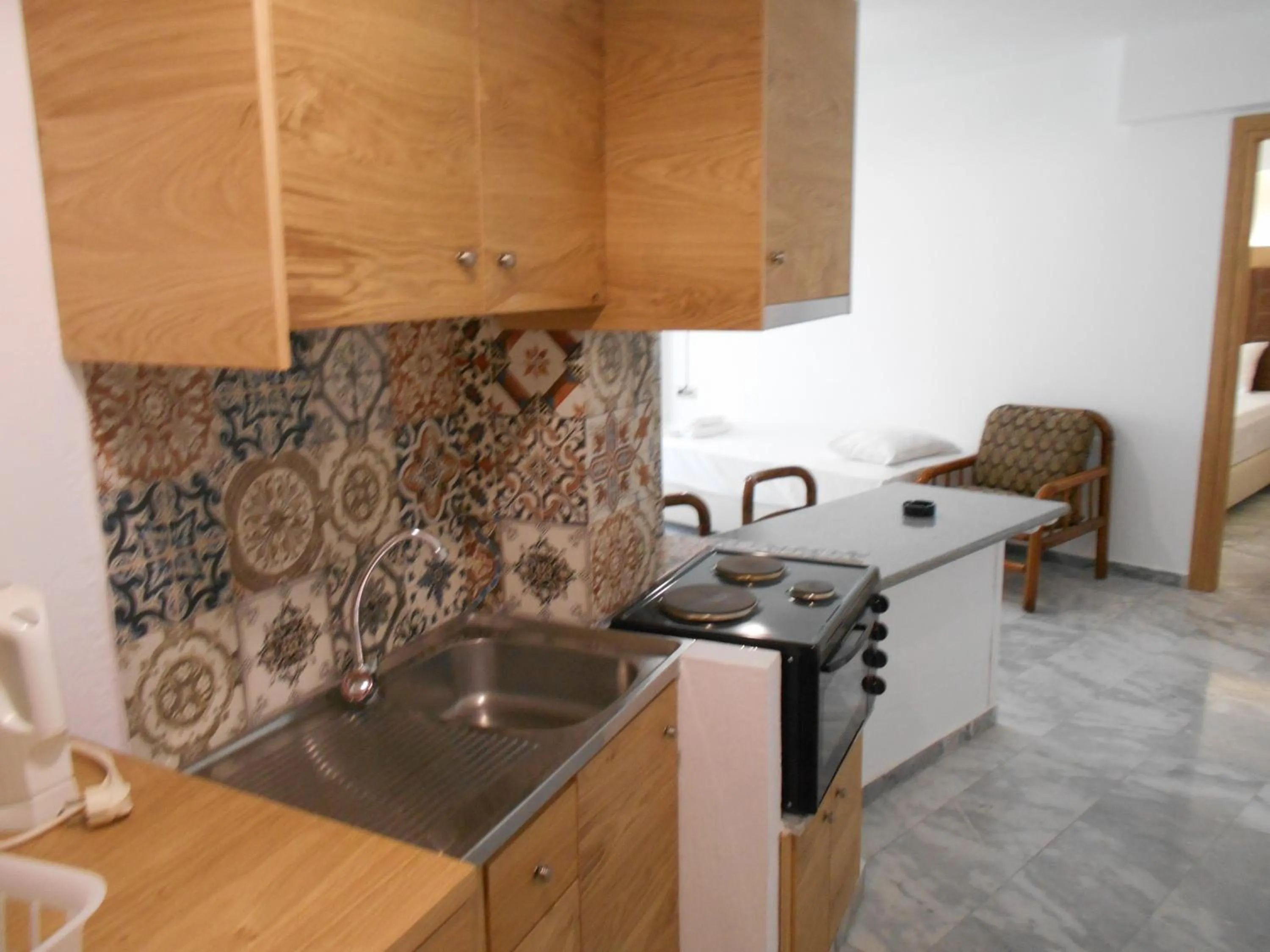 Kitchen or kitchenette in Artemis Hotel Apartments