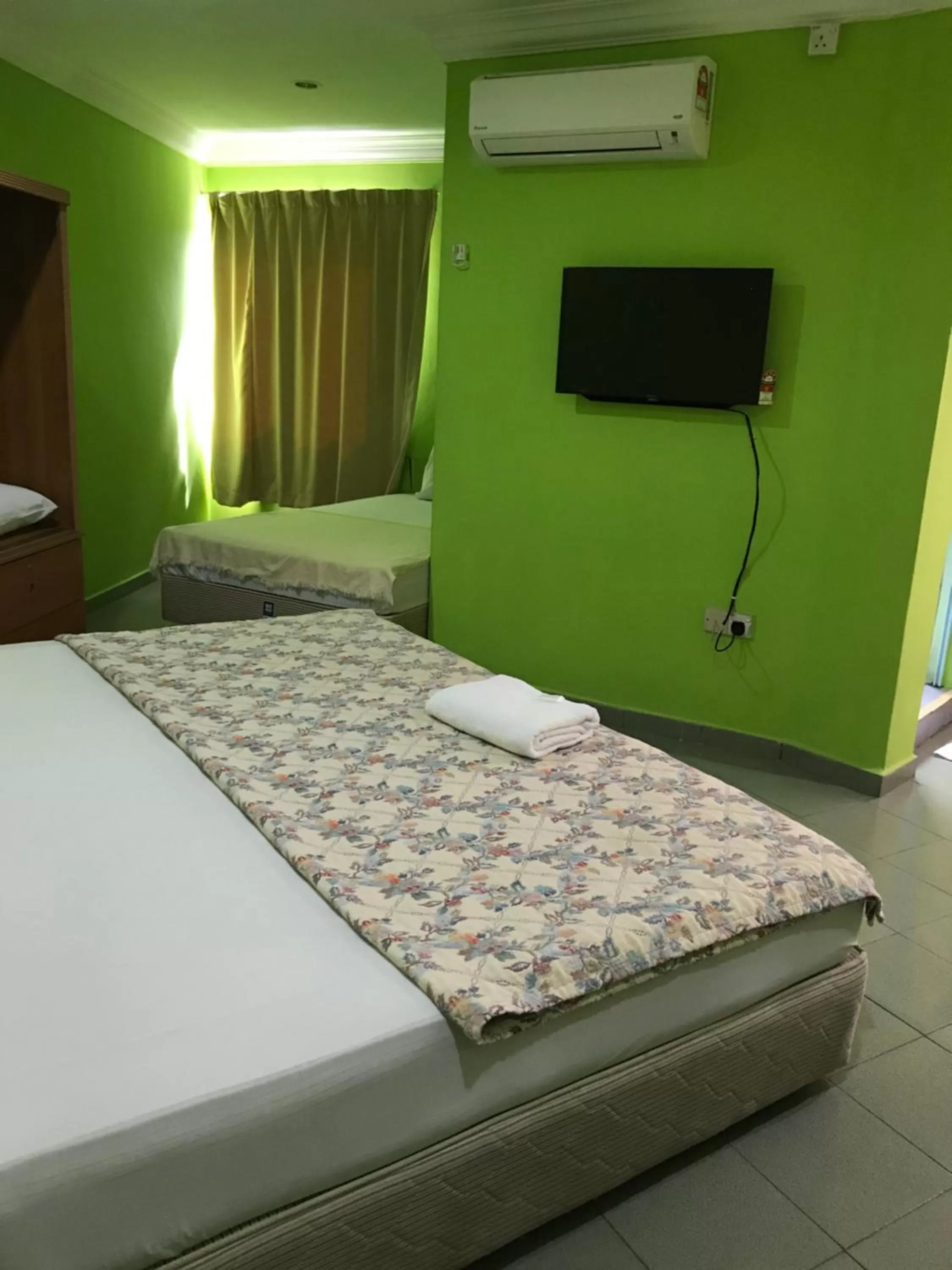 Bed in Hotel Cahaya