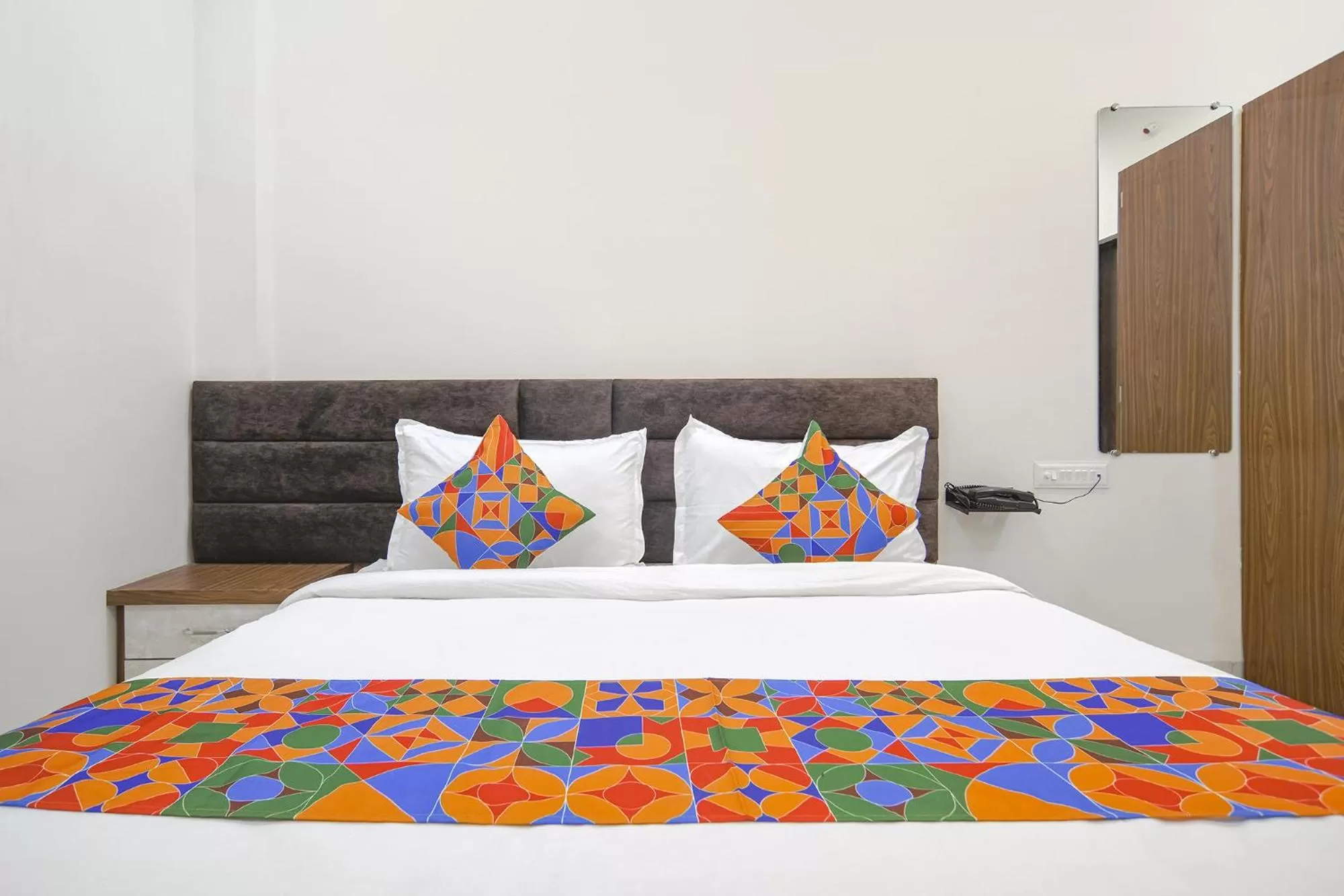 Bed in FabHotel Ramya