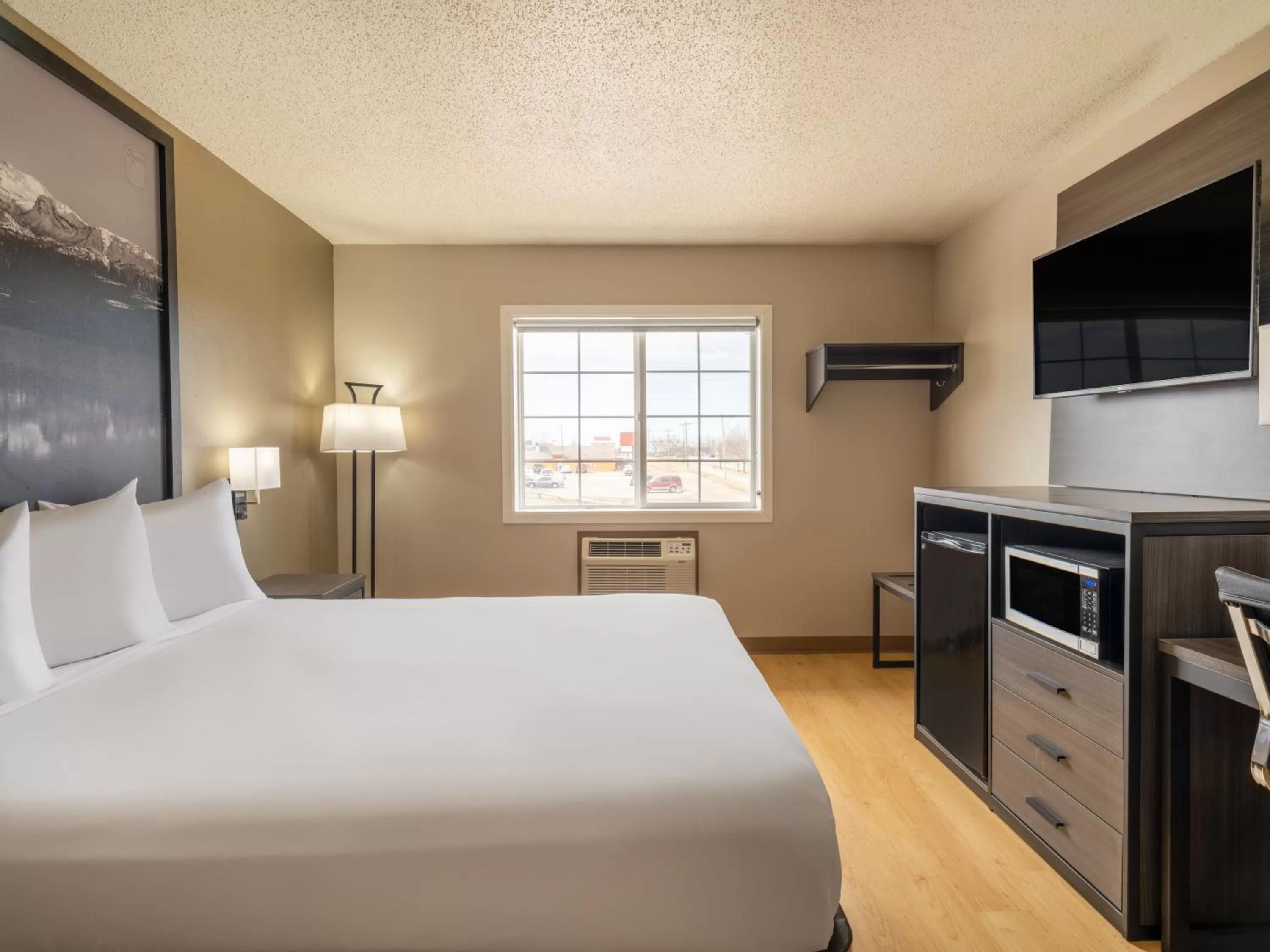 Bed in Super 8 by Wyndham Clinton