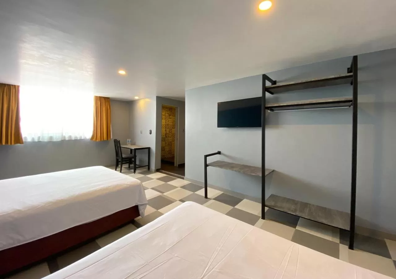 Photo of the whole room, Bed in Hotel Estrella de Oriente