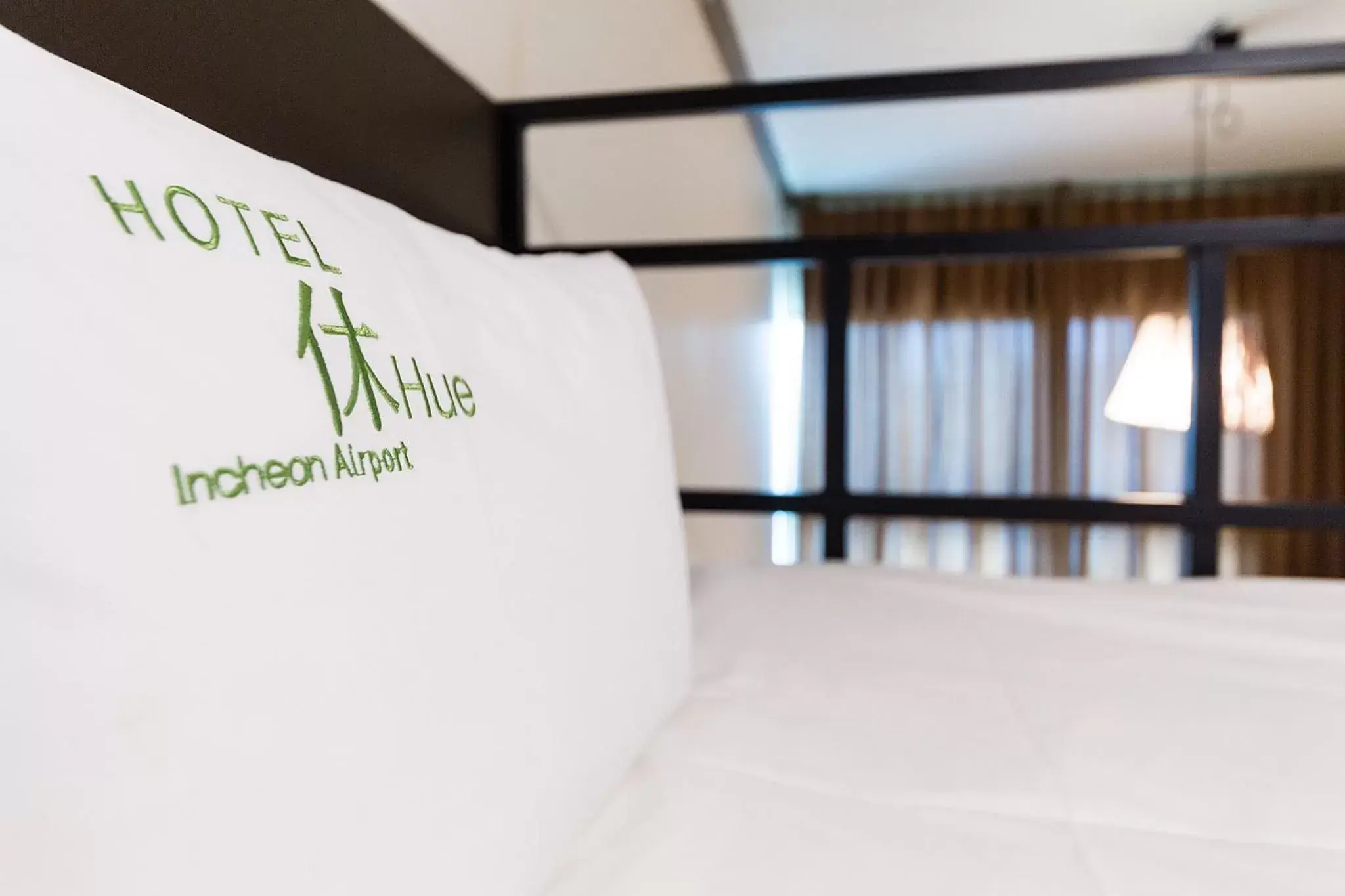 Bed, Property Logo/Sign in Hotel Hue Loft